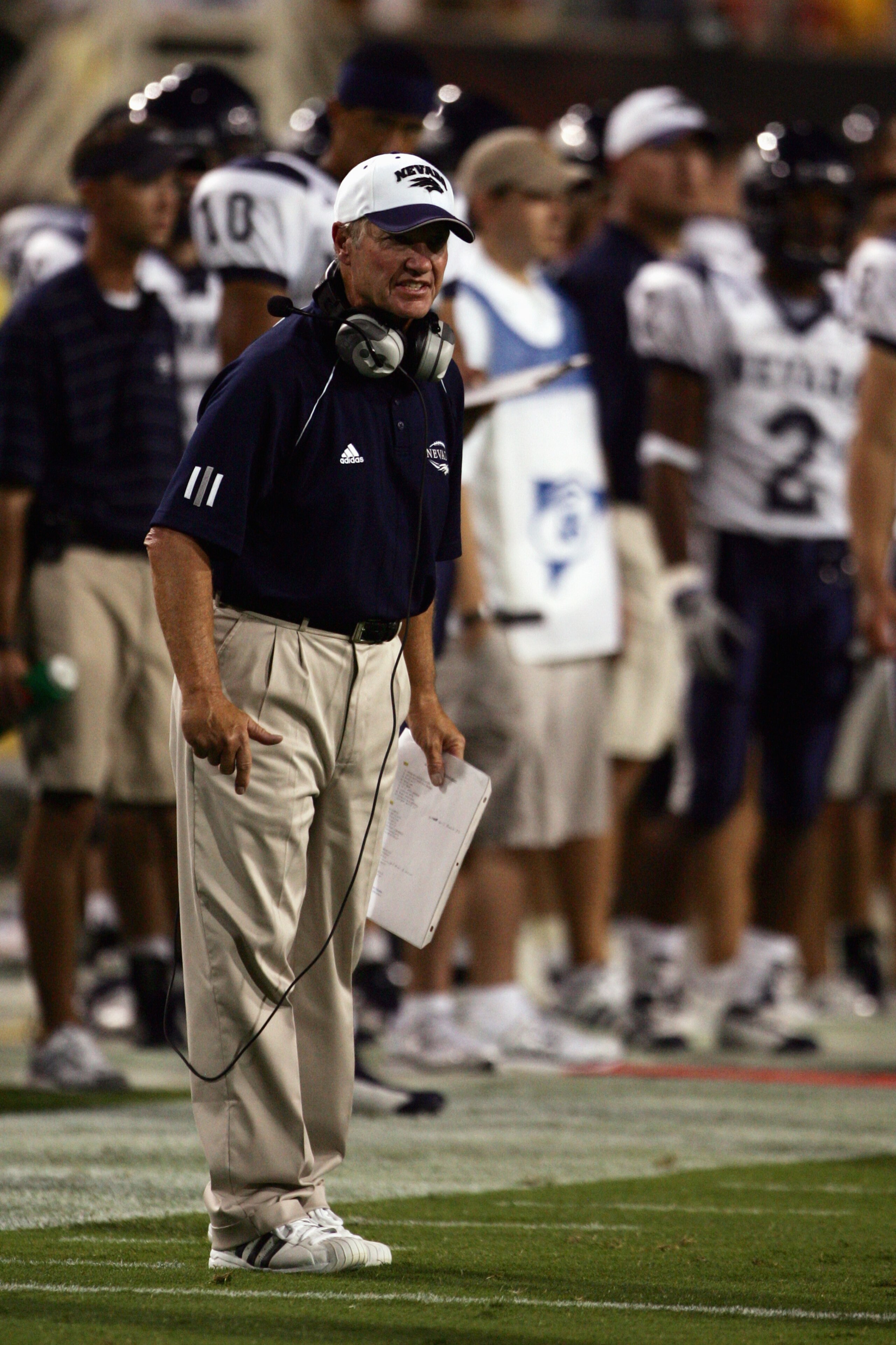 TEMPE, AZ - SEPTEMBER 9: Head coach Chris Ault of the Nevada Wolf Pack looks on during the game against the Arizona State Sun Devils at Sun Devil Stadium on September 9, 2006 in Tempe, Arizona. Arizona State won 52-21. (Photo by Harry How/Getty Images) TEMPE, AZ - SEPTEMBER 9: Head coach Chris Ault of the Nevada Wolf Pack looks on during the game against the Arizona State Sun Devils at Sun Devil Stadium on September 9, 2006 in Tempe, Arizona. Arizona State won 52-21. (Photo by Harry How/Getty Images)