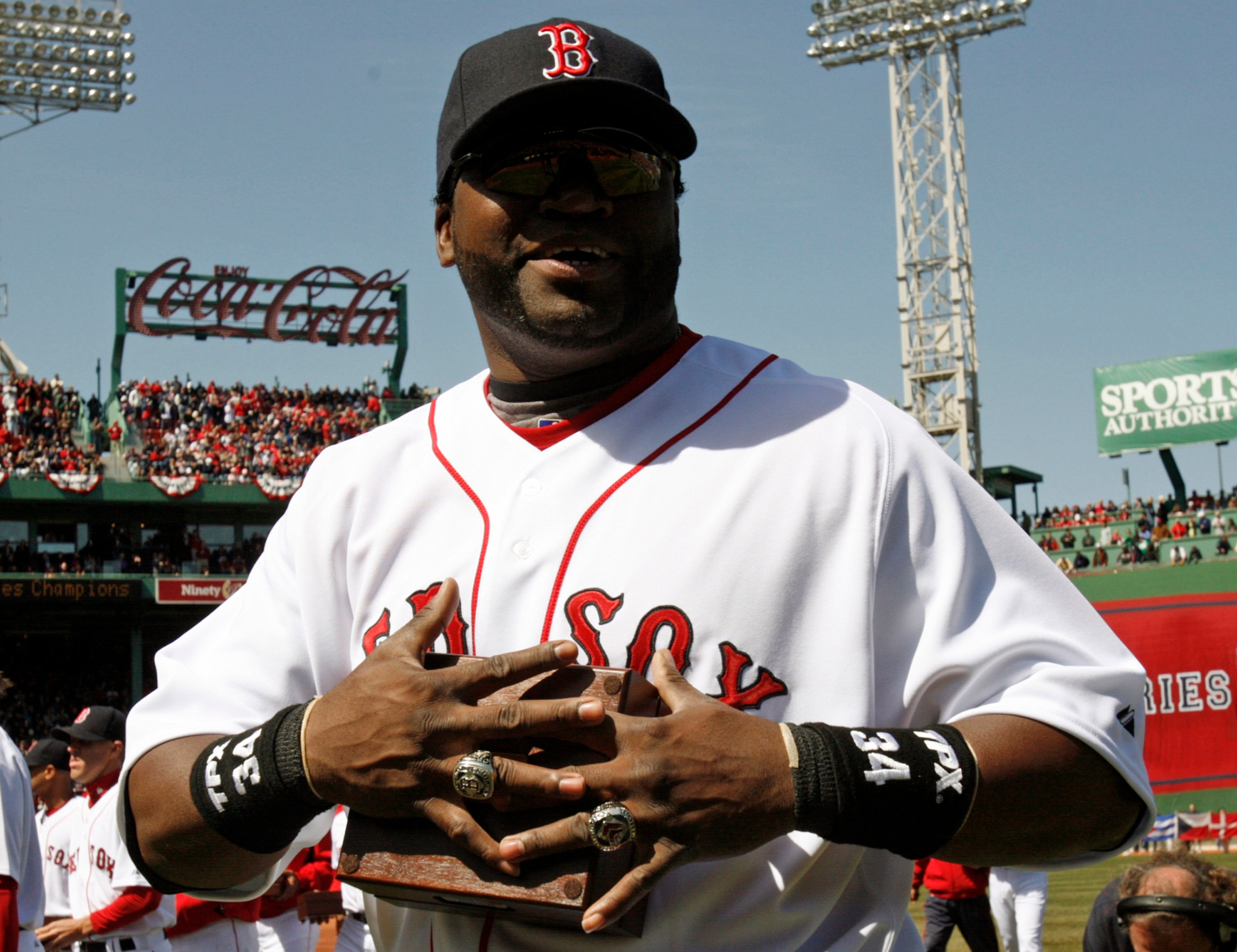 BOSTON - APRIL 08: David Ortiz of the Boston Red Sox shows off his 2004 and 2007 World Series rings during pre-game ceremonies before the Red Sox MLB baseball game against the Detroit Tigers on April 8, 2008 at Fenway Park in Boston, Massachusetts. Red S BOSTON - APRIL 08: David Ortiz of the Boston Red Sox shows off his 2004 and 2007 World Series rings during pre-game ceremonies before the Red Sox MLB baseball game against the Detroit Tigers on April 8, 2008 at Fenway Park in Boston, Massachusetts. Red S