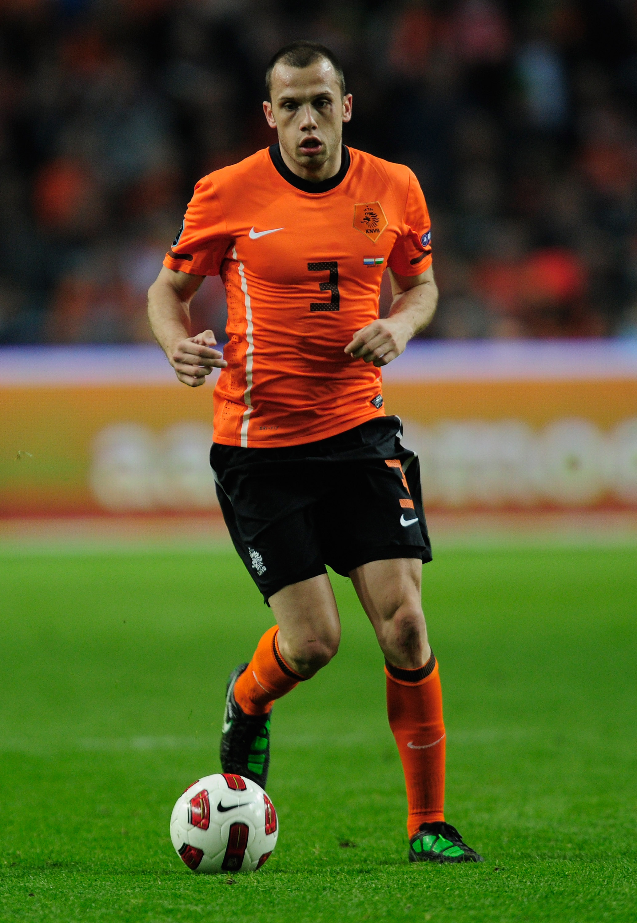 AMSTERDAM, NETHERLANDS - MARCH 29:  John Heitinga of the Netherlands in action during the Group E, EURO 2012 Qualifier between Netherlands and Hungary at the Amsterdam Arena on March 29, 2011 in Amsterdam, Netherlands.  (Photo by Jamie McDonald/Getty Imag