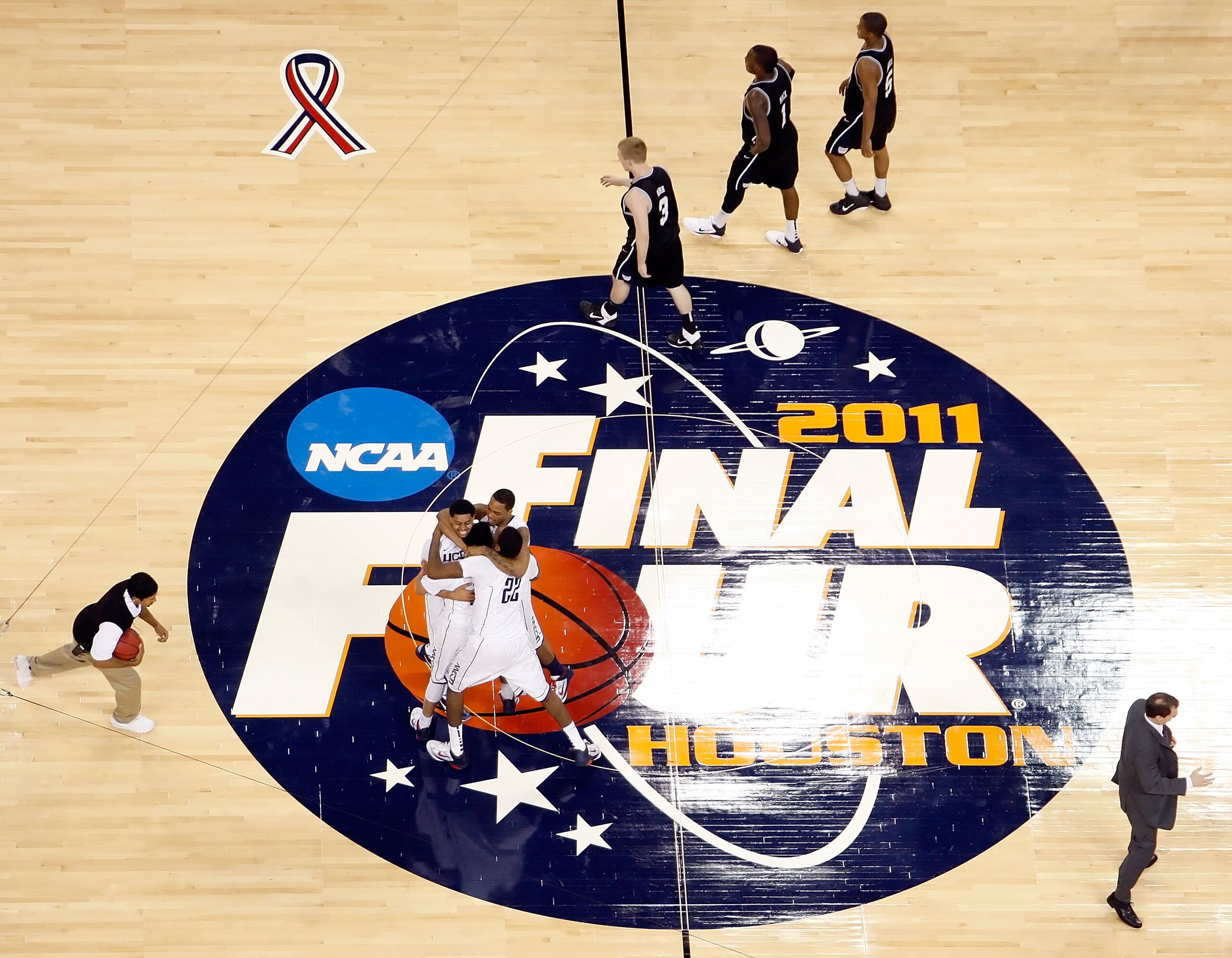 HOUSTON, TX - APRIL 04:  The Connecticut Huskies react after defeating the Butler Bulldogs to win the National Championship Game of the 2011 NCAA Division I Men's Basketball Tournament by a score of 53-41 at Reliant Stadium on April 4, 2011 in Houston, Te