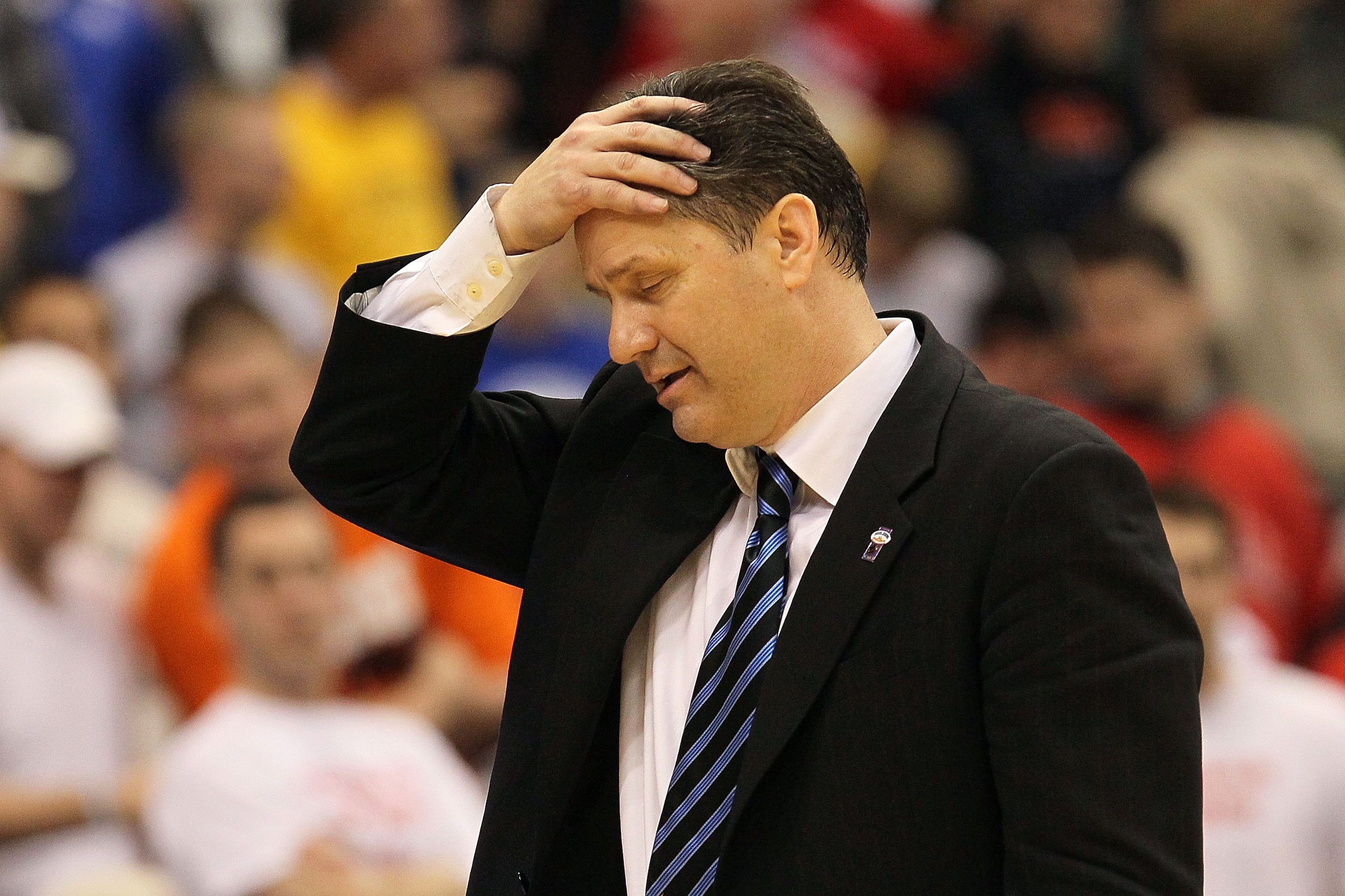 SYRACUSE, NY - MARCH 25:  Head coach John Calipari of the Kentucky Wildcats reacts as he coaches against the Cornell Big Red during the east regional semifinal of the 2010 NCAA men's basketball tournament at the Carrier Dome on March 25, 2010 in Syracuse,