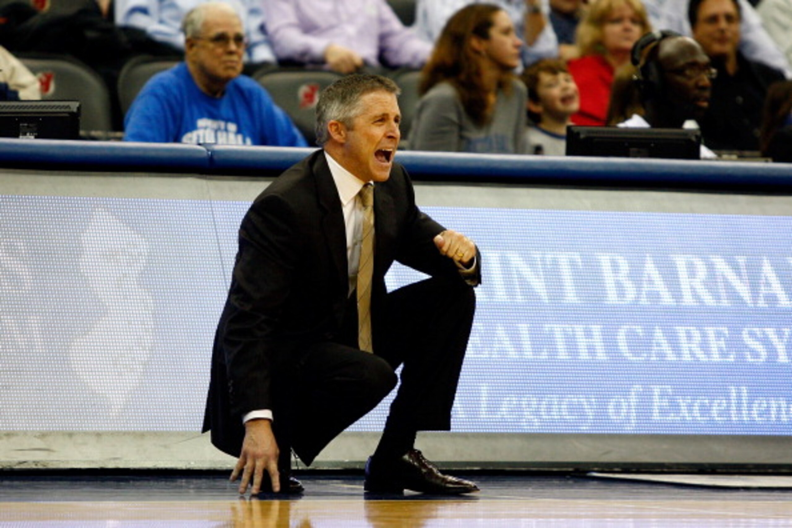 NEWARK, NJ - DECEMBER 22:  Head coach Brian Gregory of the Dayton Flyers reacts as he coaches against the Seton Hall Pirates at Prudential Center on December 22, 2010 in Newark, New Jersey.  (Photo by Chris Chambers/Getty Images)