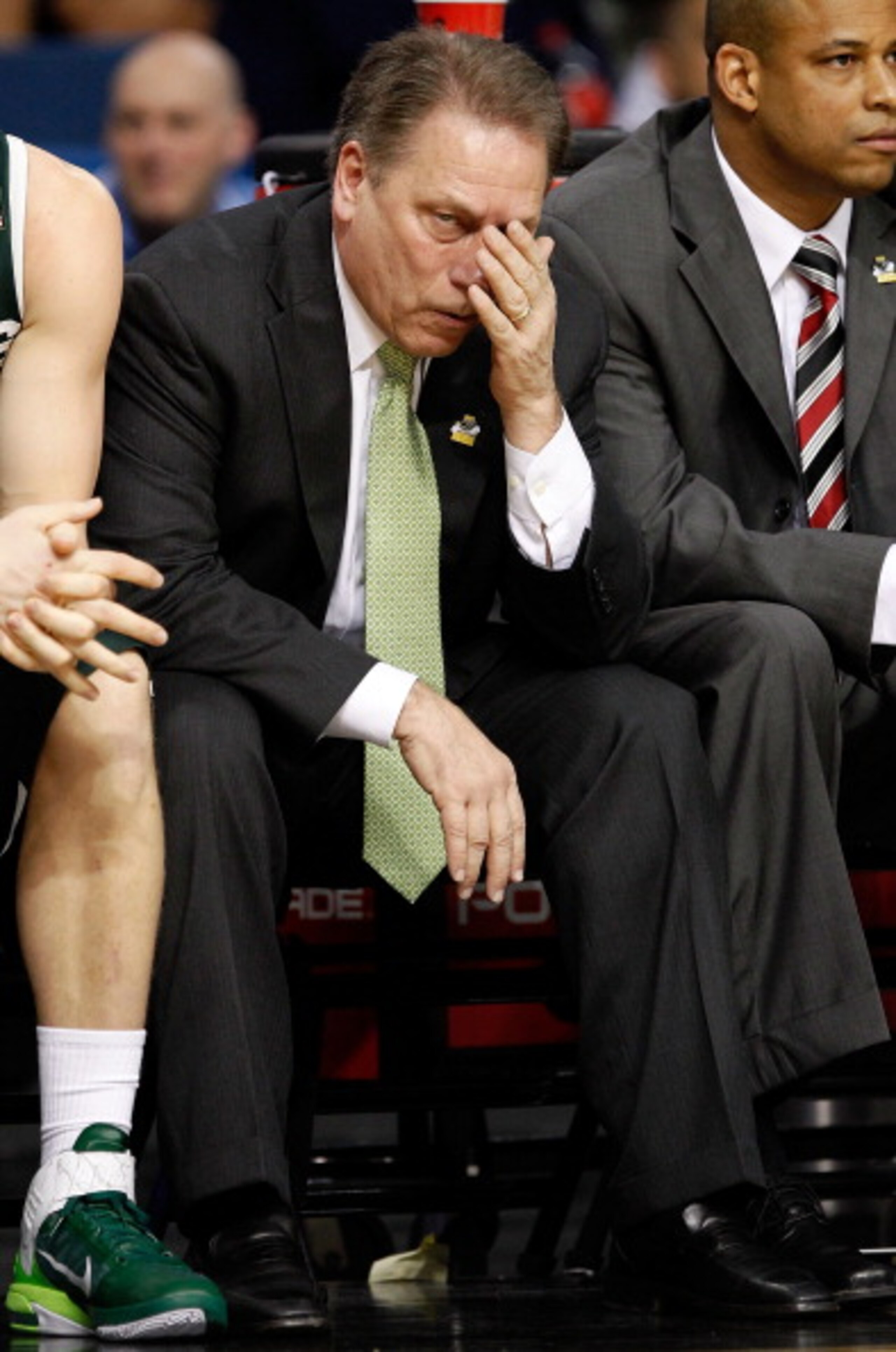 TAMPA, FL - MARCH 17:  Head coach Tom Izzo of the Michigan State Spartans covers his face on the bench against during the second round of the 2011 NCAA men's basketball tournament at St. Pete Times Forum on March 17, 2011 in Tampa, Florida.  (Photo by J.