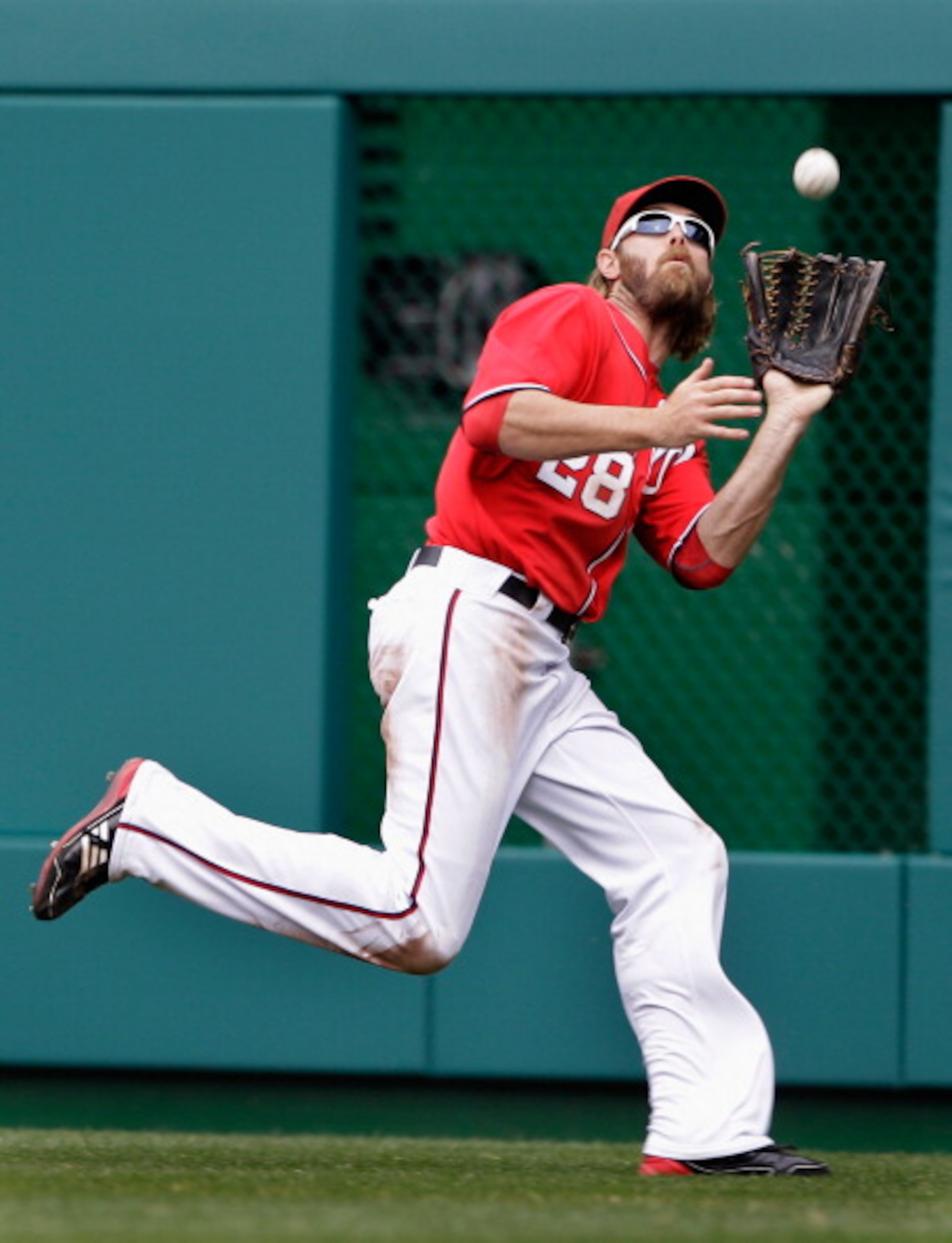 WASHINGTON, DC - APRIL 03: Right fielder Jayson Werth #28 of the Washington Nationals catches a ball hit by Dan Uggla #26 of the Atlanta Braves for an out during the sixth inning at Nationals Park on April 3, 2011 in Washington, DC.  (Photo by Rob Carr/Ge