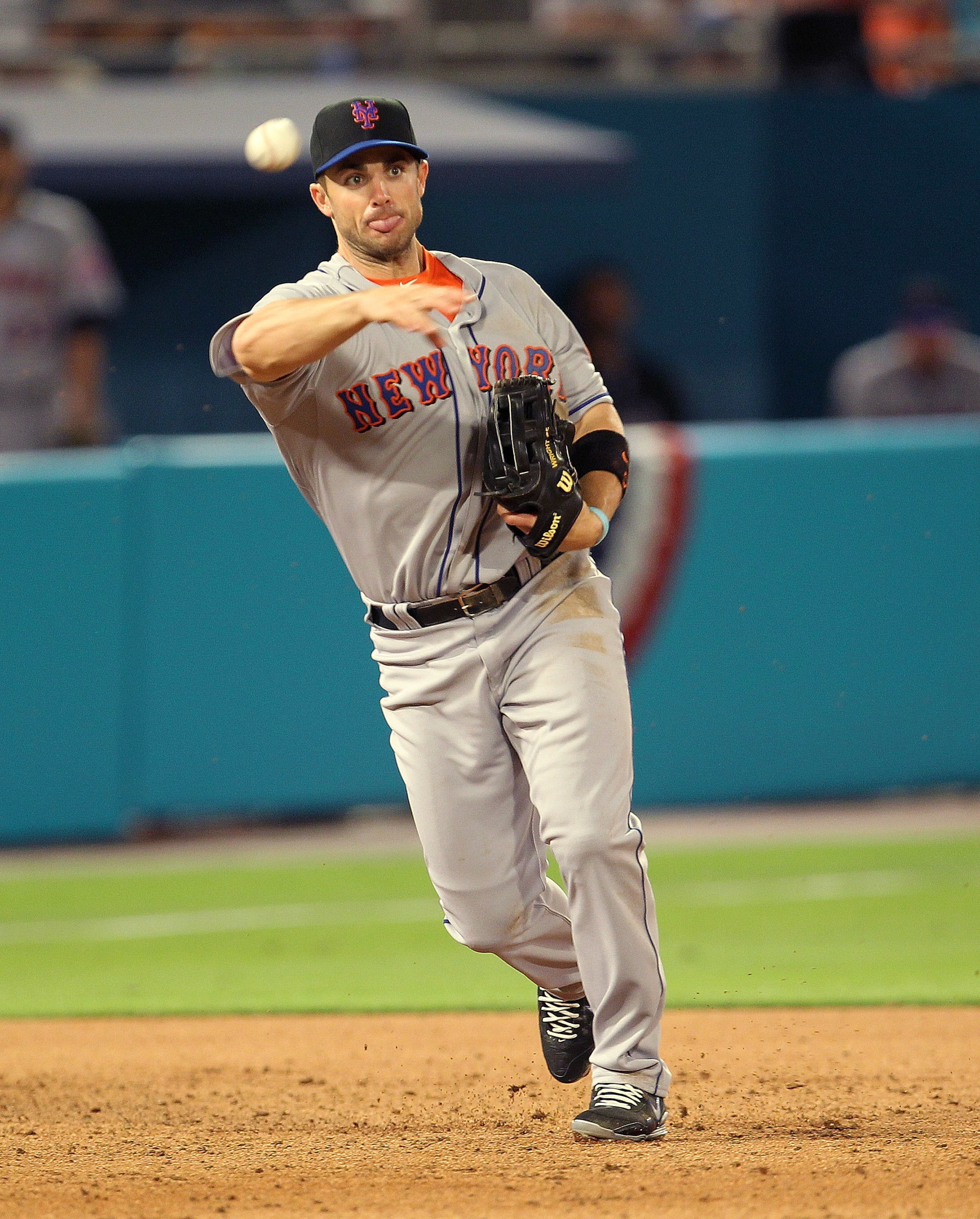 MIAMI GARDENS, FL - APRIL 01:  David Wright #5 of the New York Mets makes a throw to first during opening day against the Florida Marlins at Sun Life Stadium on April 1, 2011 in Miami Gardens, Florida.  (Photo by Mike Ehrmann/Getty Images)