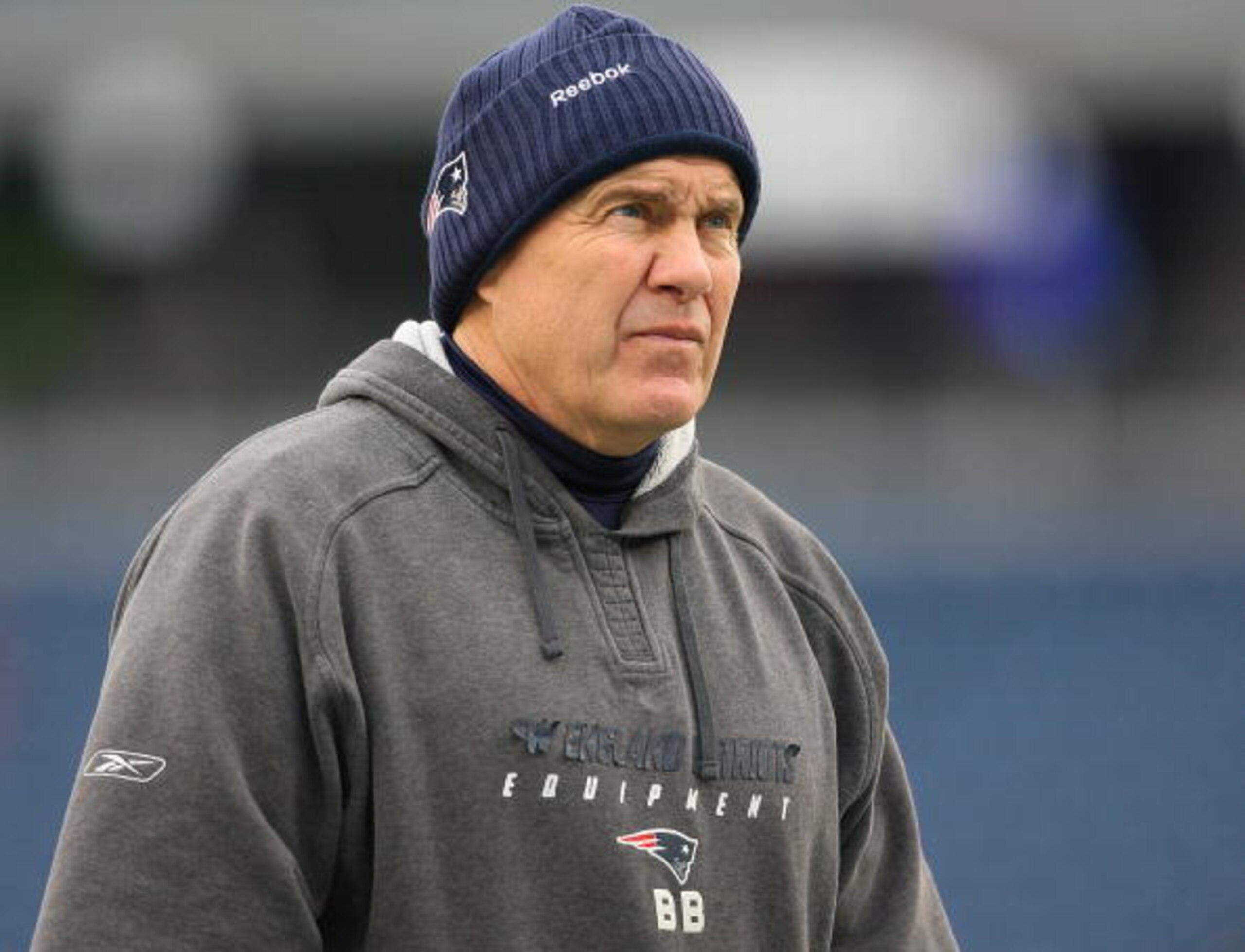 FOXBORO, MA - DECEMBER 13:  Head coach Bill Belichick of the New England Patriots  walks the field before a game against the Carolina Panthers at Gillette Stadium on December 13, 2009 in Foxboro, Massachusetts. (Photo by Jim Rogash/Getty Images)
