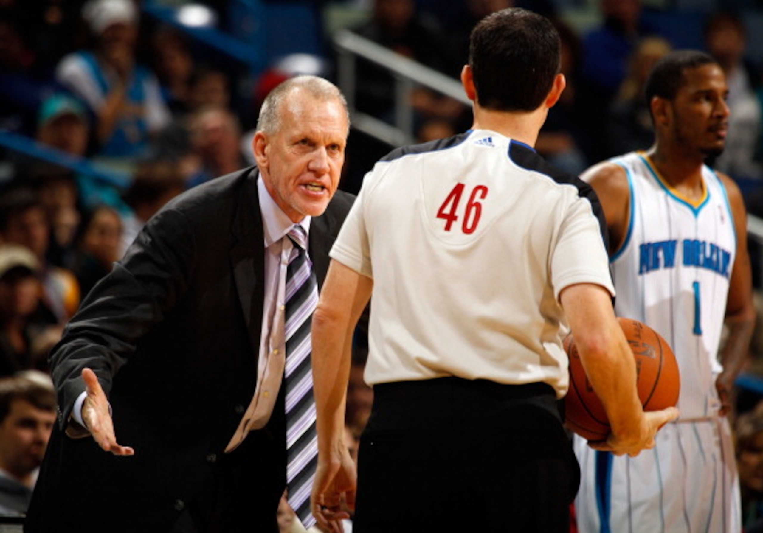 NEW ORLEANS, LA - JANUARY 03: Head coach Doug Collins of the Philadelphia 76ers argues a call with referee matt Boland in the second half against the New Orleans Hornets at New Orleans Arena on January 3, 2011 in New Orleans, Louisiana. NOTE TO USER: Use NEW ORLEANS, LA - JANUARY 03: Head coach Doug Collins of the Philadelphia 76ers argues a call with referee matt Boland in the second half against the New Orleans Hornets at New Orleans Arena on January 3, 2011 in New Orleans, Louisiana. NOTE TO USER: Use