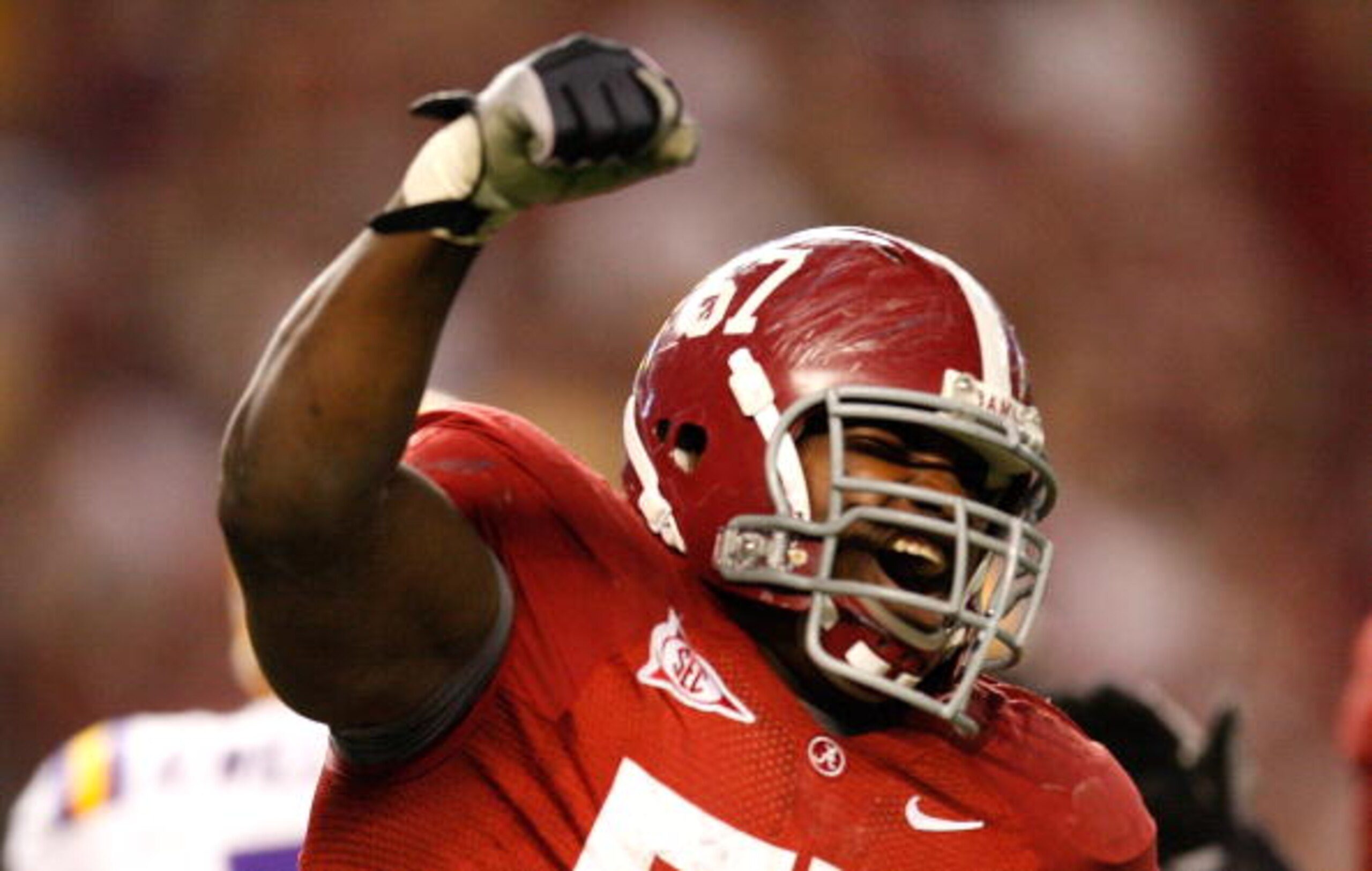 TUSCALOOSA, AL - NOVEMBER 07:  Marcell Dareus #57 of the Alabama Crimson Tide celebrates his sack against the Louisiana State University Tigers at Bryant-Denny Stadium on November 7, 2009 in Tuscaloosa, Alabama.  (Photo by Kevin C. Cox/Getty Images)