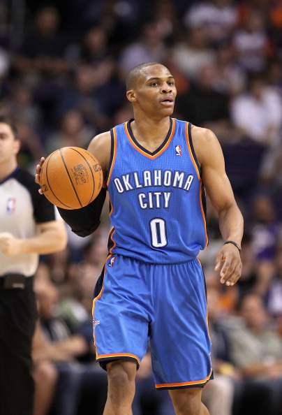 PHOENIX, AZ - MARCH 30:  Russell Westbrook #0 of the Oklahoma City Thunder handles the ball during the NBA game against the Phoenix Suns at US Airways Center on March 30, 2011 in Phoenix, Arizona. The Thunder defeated the Suns 116-98.   NOTE TO USER: User