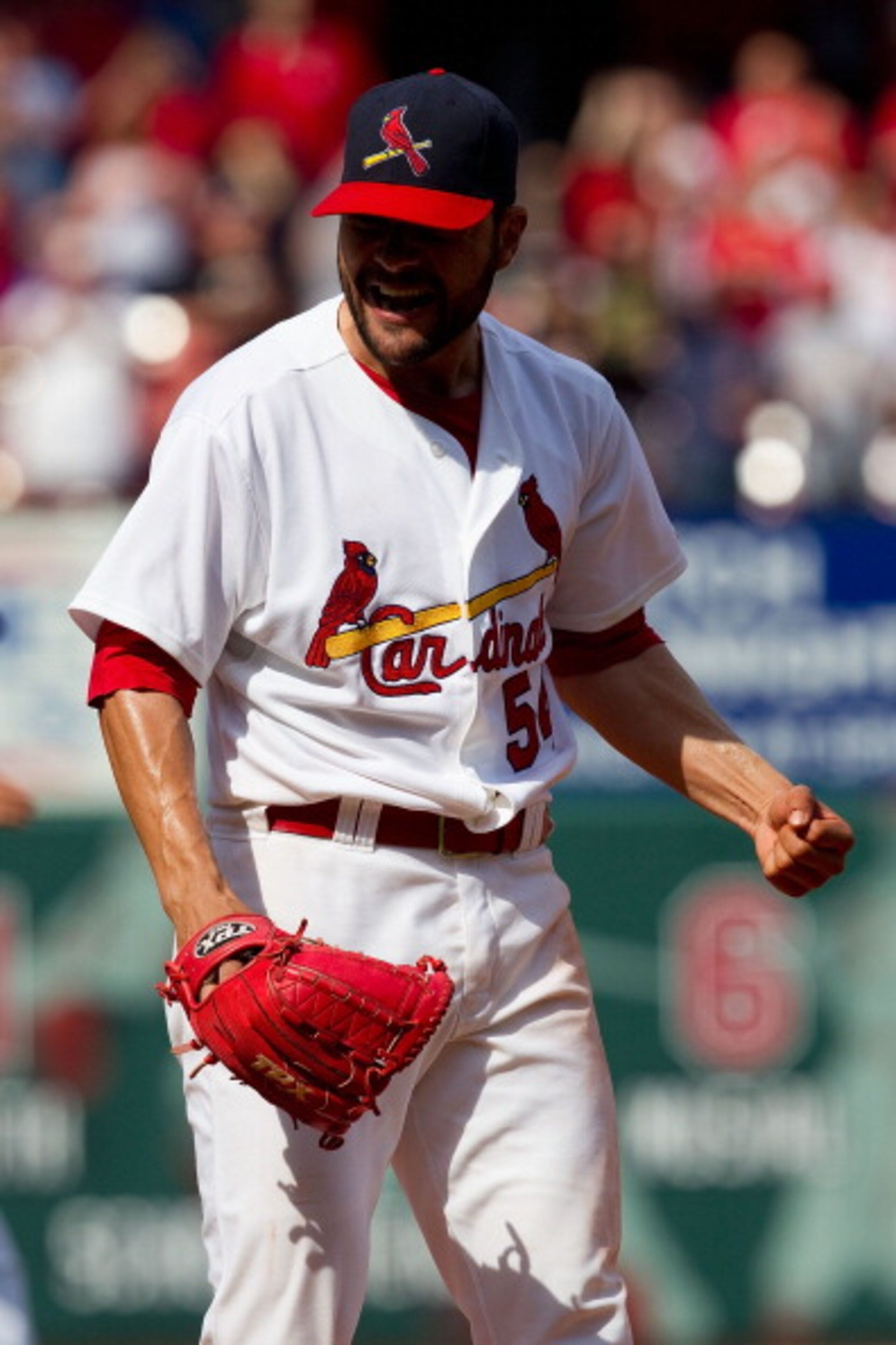 ST. LOUIS, MO - APRIL 3: Jaime Garcia #54 of the St. Louis Cardinals celebrates his complete-game victory over the San Diego Padres at Busch Stadium on April 3, 2011 in St. Louis, Missouri.  (Photo by Dilip Vishwanat/Getty Images)