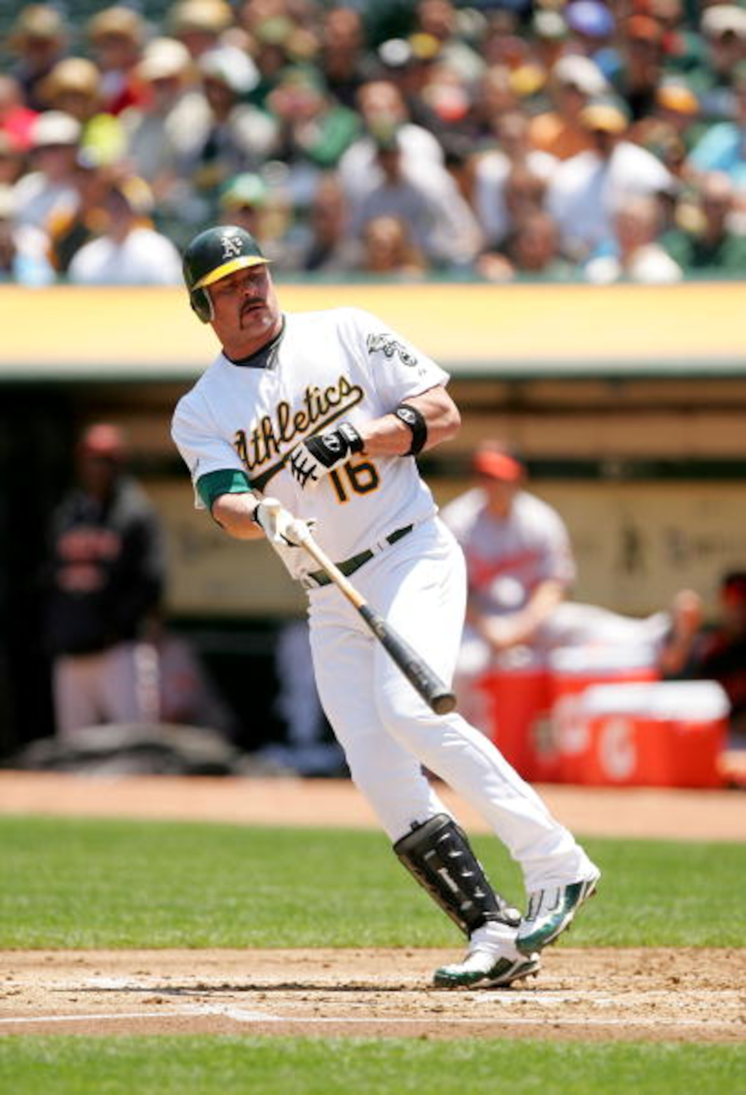 OAKLAND, CA - JUNE 07: Jason Giambi #16 of the Oakland Athletics tosses his bat after being walked in the first inning of their game against the Baltimore Orioles at the Oakland Coliseum on June 7, 2009 in Oakland, California. Orlando Cabrera #18 scored OAKLAND, CA - JUNE 07: Jason Giambi #16 of the Oakland Athletics tosses his bat after being walked in the first inning of their game against the Baltimore Orioles at the Oakland Coliseum on June 7, 2009 in Oakland, California. Orlando Cabrera #18 scored