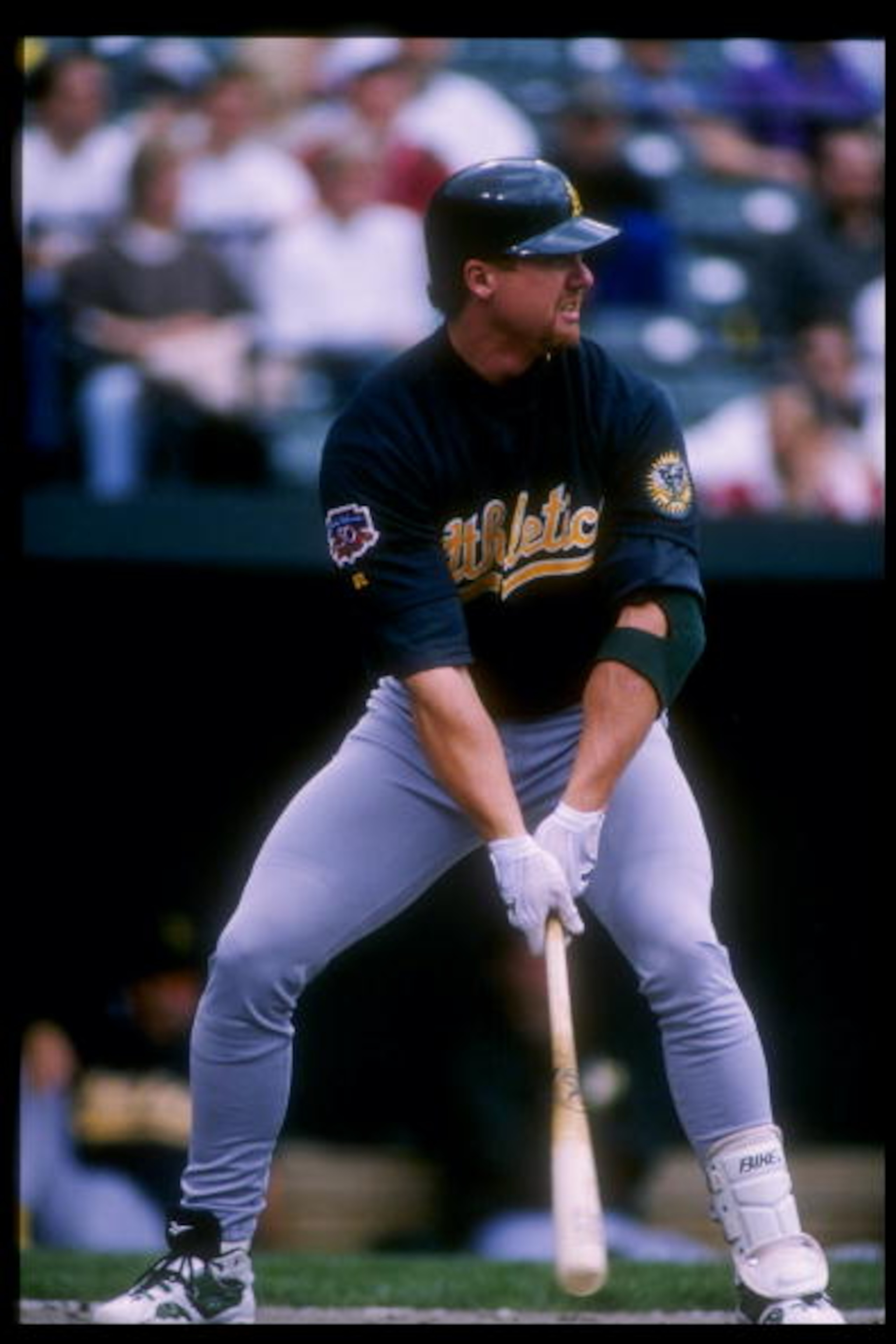 3 May 1997:  Infielder Mark McGwire of the Oakland Athletics prepares to take his turn at bat during a game against the Baltimore Orioles at Oriole Park at Camden Yards in Baltimore, Maryland.  The A''s won the game 4-3. Mandatory Credit: Doug Pensinger