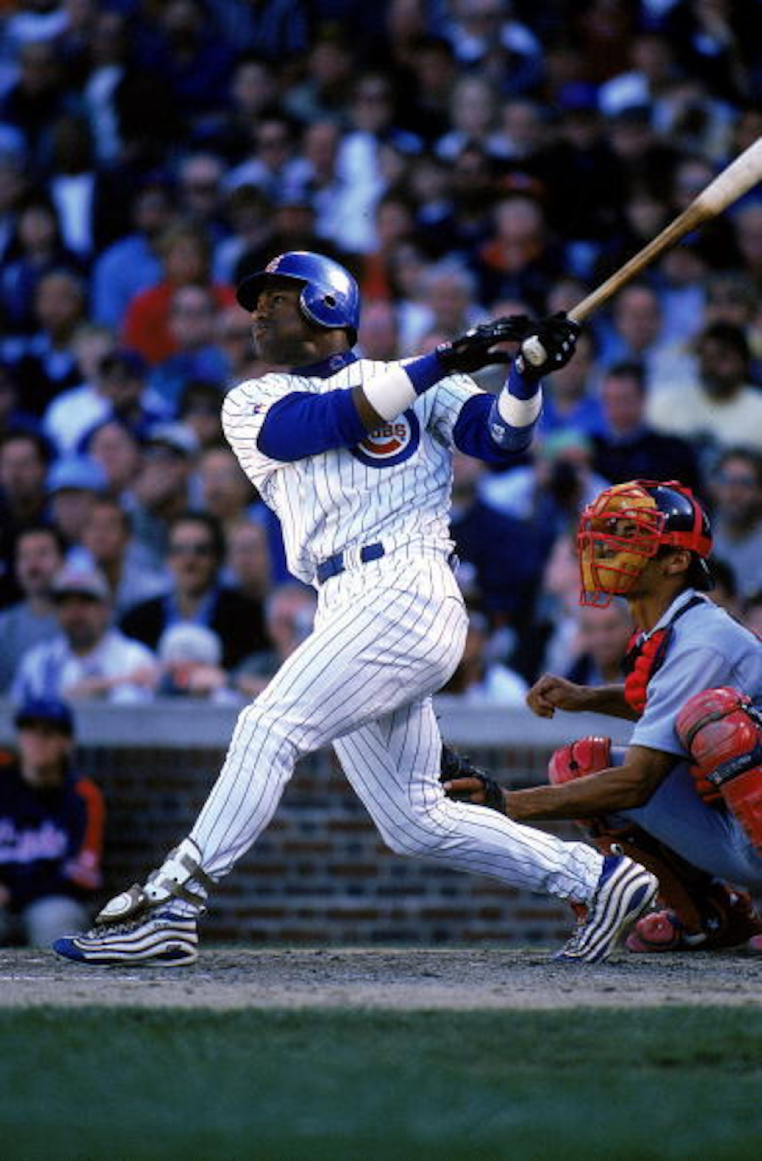 20 Sep 1999:  Sammy Sosa #21 of the Chicago Cubs watches his ball during a game against the St. Louis Cardinals at Wrigley Field in Chicago, Illinois. The Cardinals defeated the Cubs 7-2. Mandatory Credit: Jonathan Daniel  /Allsport