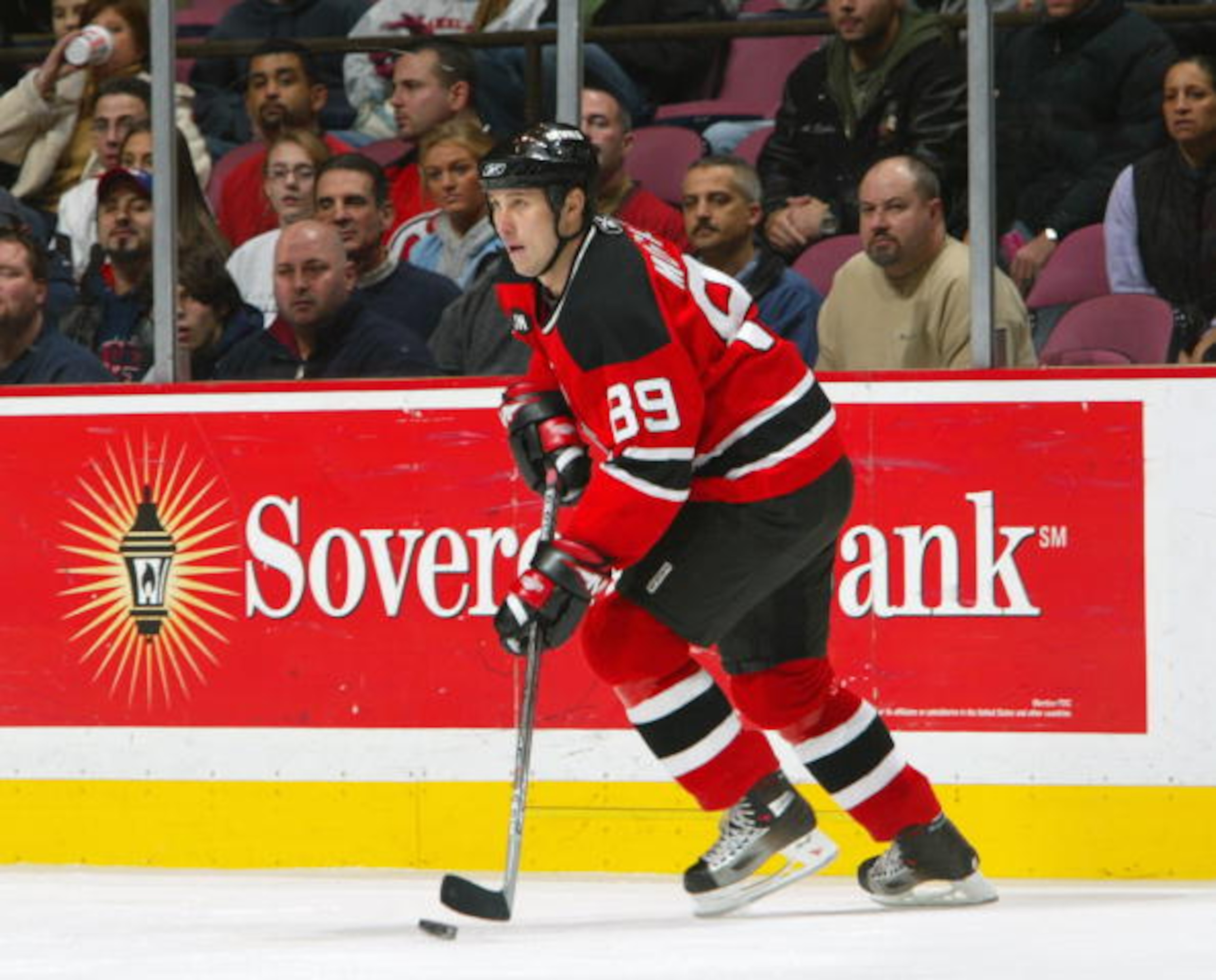 EAST RUTHERFORD, NJ - DECEMBER 13:  Alexander Mogilny #89of the New Jersey Devils controls the puck during the game against the Edmonton Oilers on December 13, 2005 at the Continental Airlines Arena in East Rutherford, New Jersey. (Photo by: Al Bello/Gett