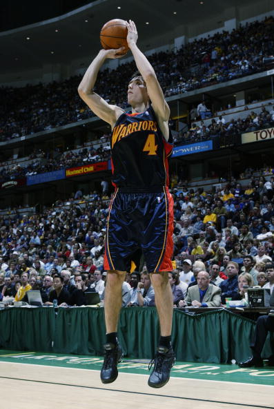 ANAHEIM, CA - OCTOBER 17:  Jiri Welsch #4 of the Golden State Warriors puts a shot up during a preseason game against the Los Angeles Lakers on October 17, 2002 at The Arrowhead Pond of Anaheim in Anaheim, California.  NOTE TO USER: User expressly acknowl
