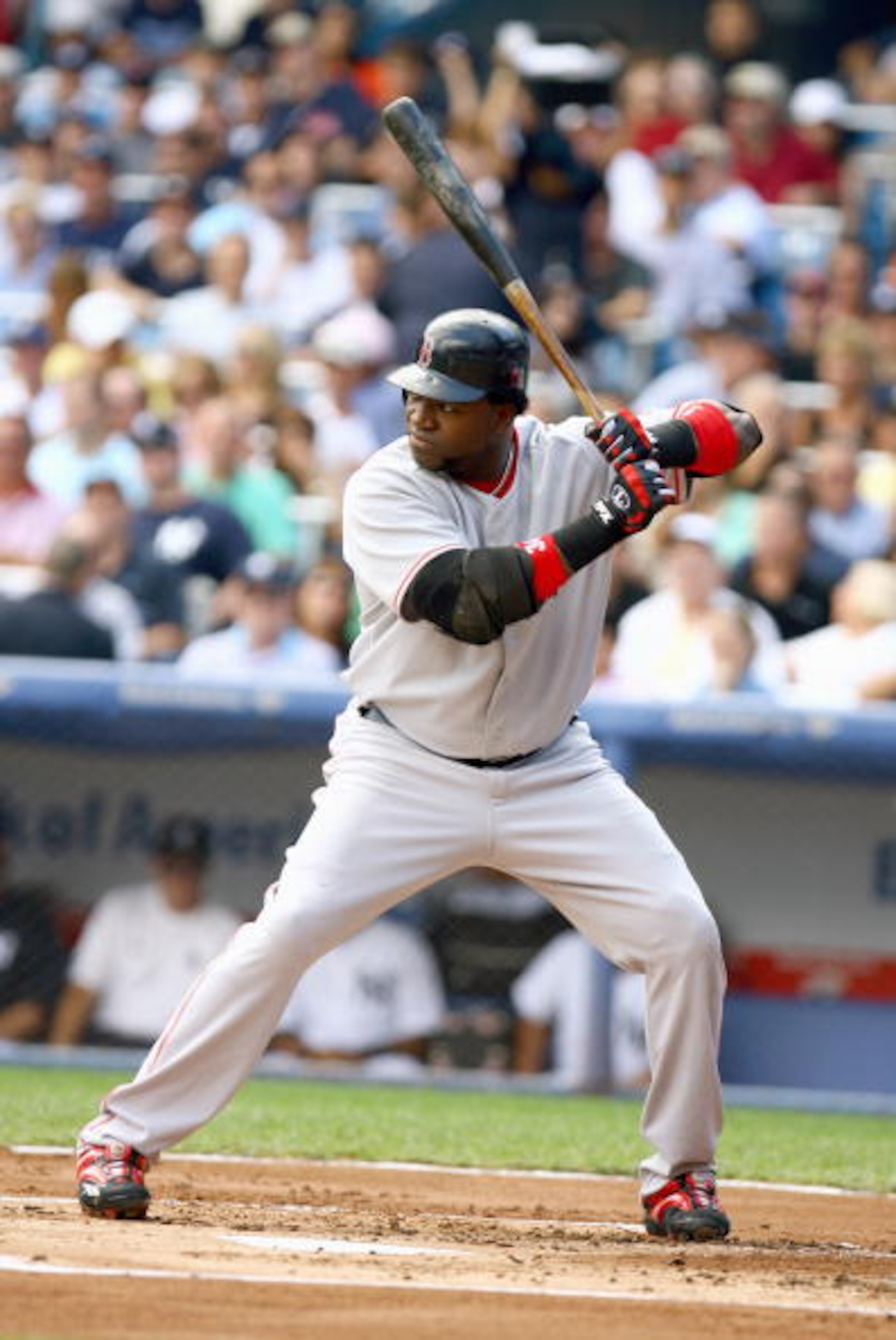 NEW YORK - SEPTEMBER 16: David Ortiz #34 of the Boston Red Sox swings at the pitch against The New York Yankees during their game on September 16, 2006 at Yankee Stadium in the Bronx borough of New York City. (Photo by Al Bello/Getty Images)