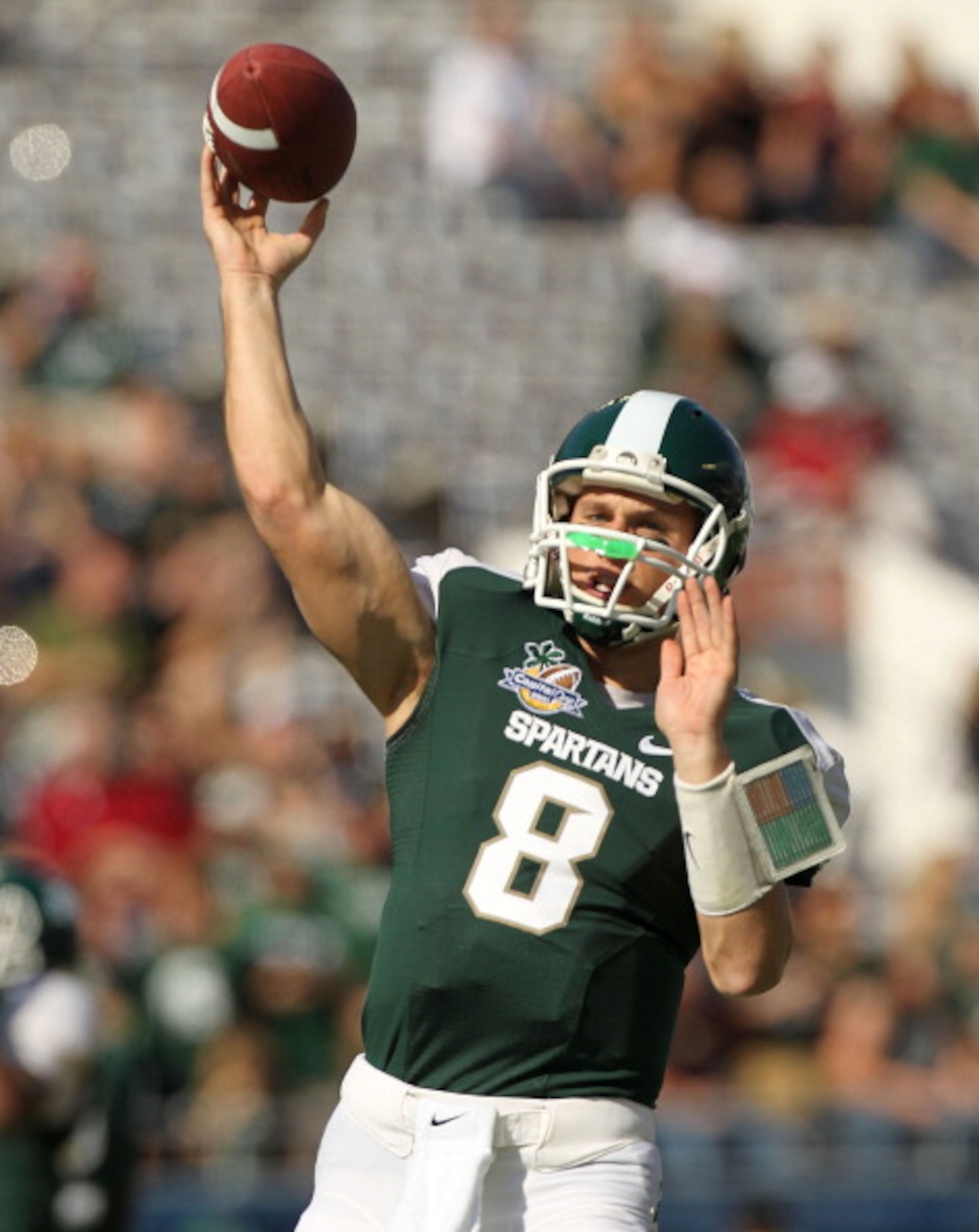 ORLANDO, FL - JANUARY 01: Kirk Cousins #8 of the Michigan State Spartans warms up during the Capitol One Bowl against the Alabama Crimson Tide at the Florida Citrus Bowl on January 1, 2011 in Orlando, Florida. (Photo by Mike Ehrmann/Getty Images) ORLANDO, FL - JANUARY 01: Kirk Cousins #8 of the Michigan State Spartans warms up during the Capitol One Bowl against the Alabama Crimson Tide at the Florida Citrus Bowl on January 1, 2011 in Orlando, Florida. (Photo by Mike Ehrmann/Getty Images)