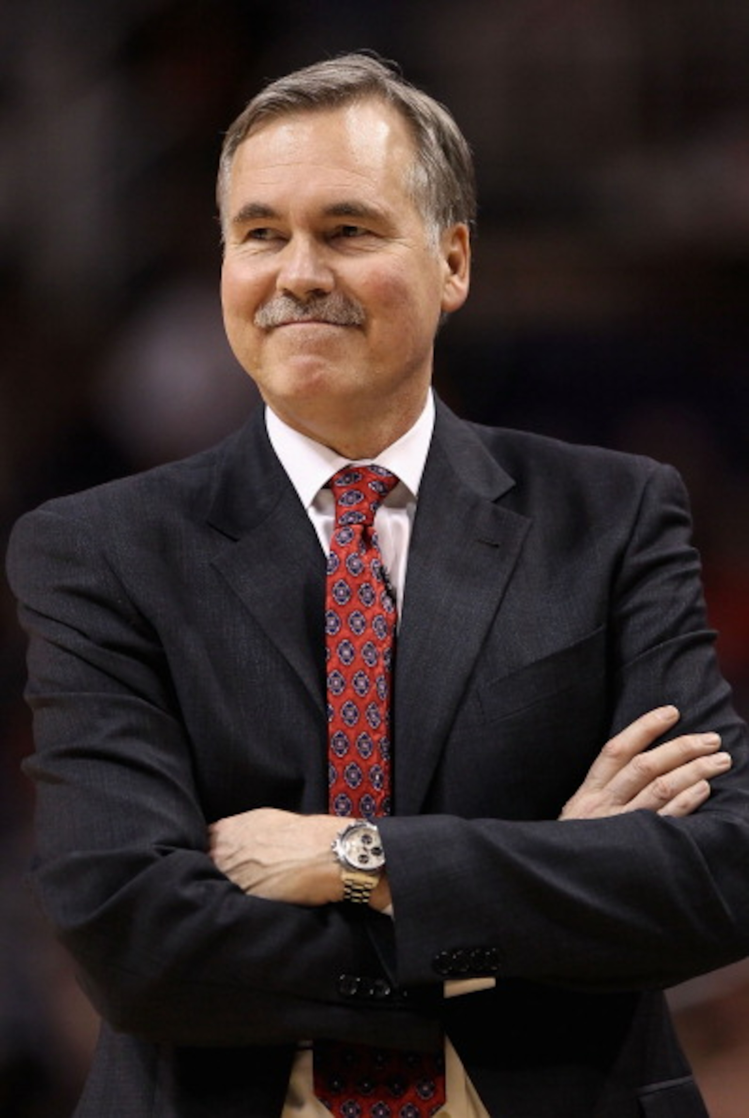 PHOENIX - JANUARY 07:  Head coach Mike D'Antoni of the New York Knicks smiles during the NBA game against the Phoenix Suns at US Airways Center on January 7, 2011 in Phoenix, Arizona.  The Knicks defeated the Suns 121-96.  NOTE TO USER: User expressly ack