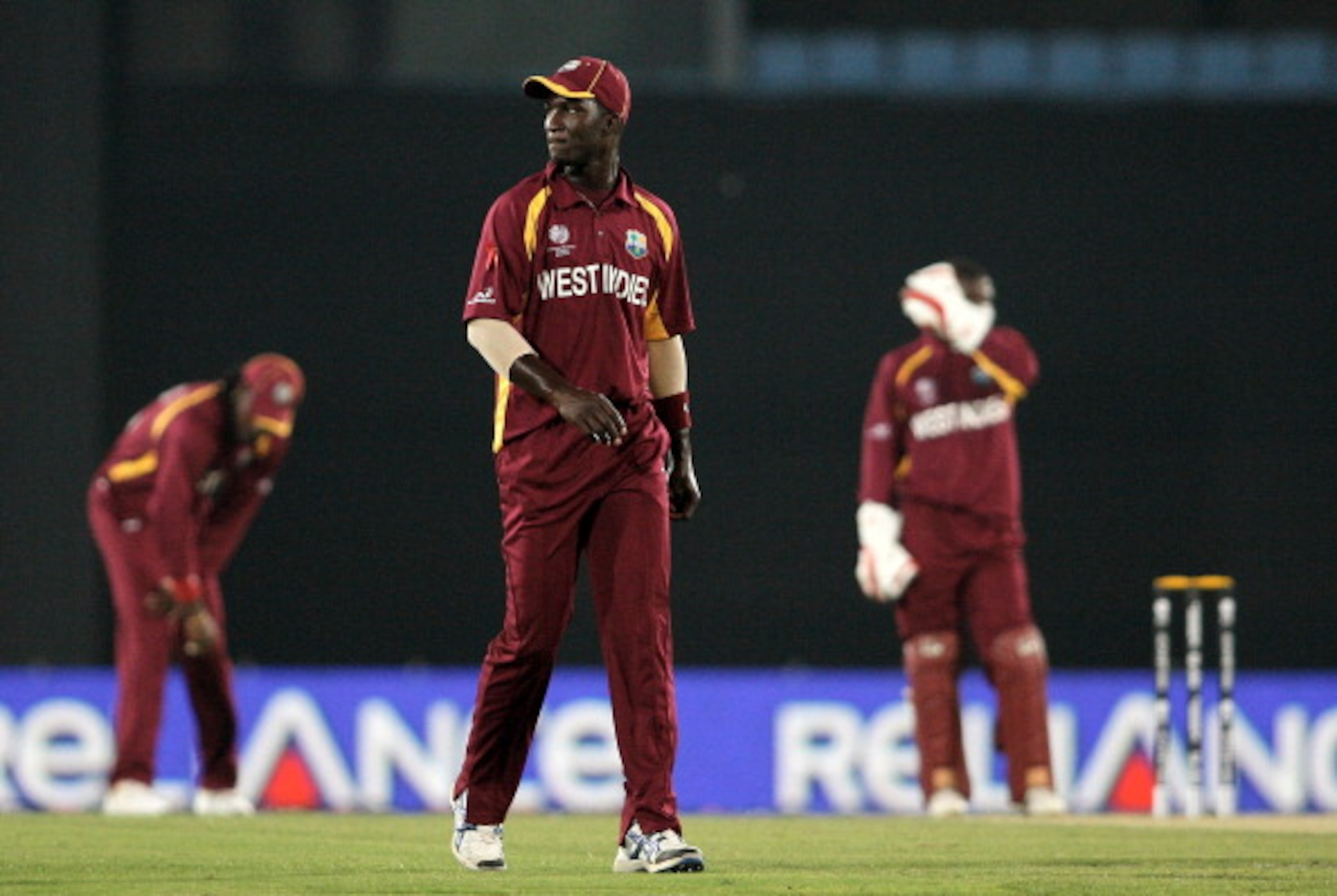 DHAKA, BANGLADESH - MARCH 23:  Darren Sammy of West Indies fielding against Pakistan during the first quarter-final match of the ICC Cricket World Cup between Pakistan and West Indies at Shere-e-Bangla National Stadium on March 23, 2011 in Dhaka, Banglade
