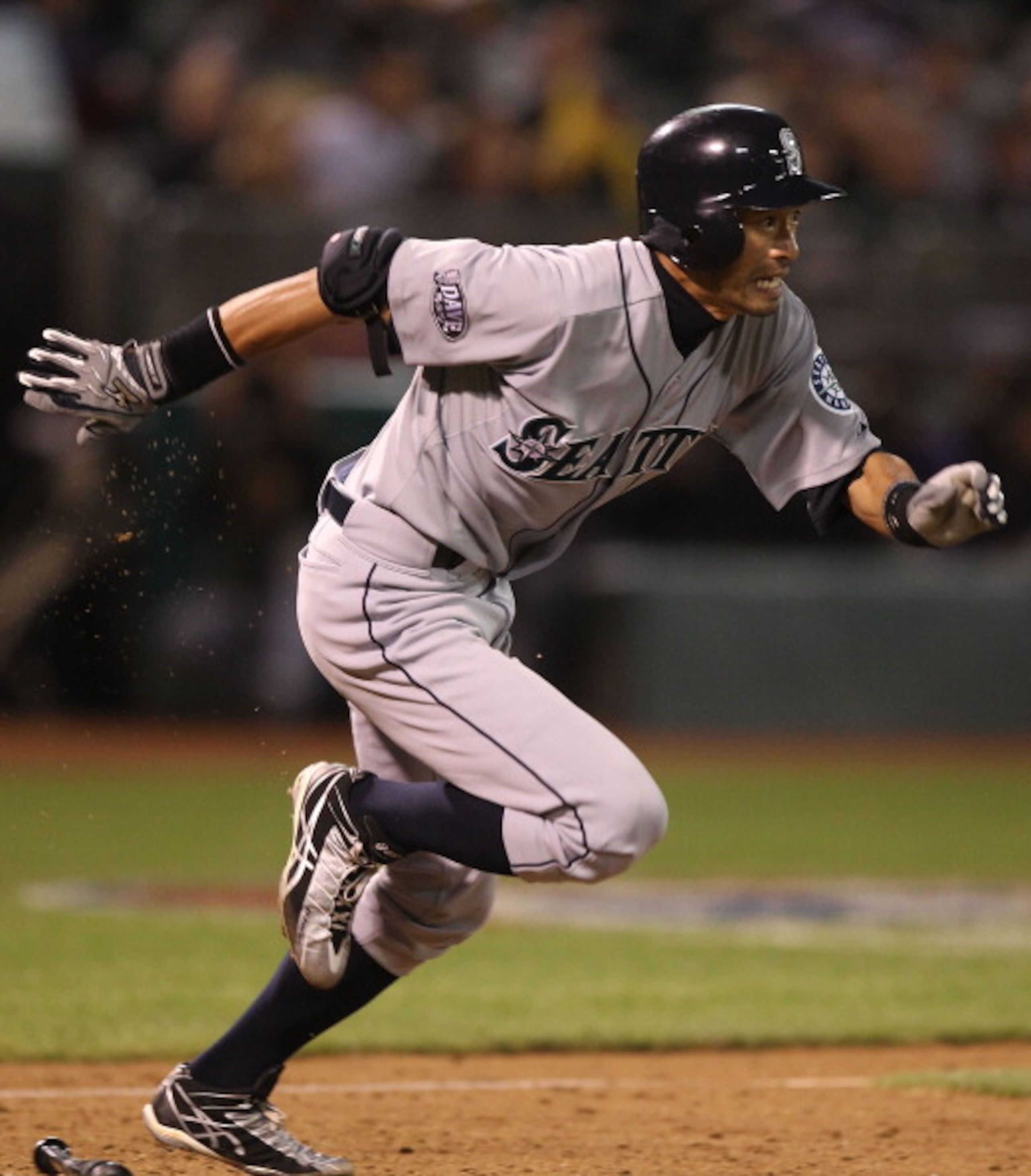 OAKLAND, CA - APRIL 02:  Ichiro Suzuki #51 of the Seattle Mariners hits a fielder's choice in the ninth inning against the Oakland Athletics during a Major League Baseball game at the Oakland-Alameda County Coliseum on April 2, 2011 in Oakland, California
