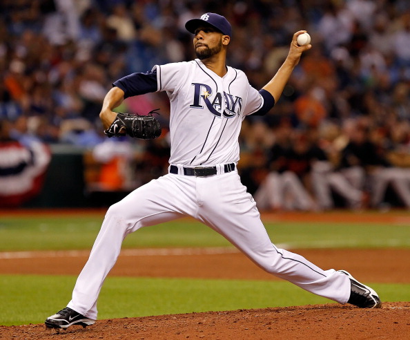 ST. PETERSBURG, FL - APRIL 01:  Pitcher David Price #14 of the Tampa Bay Rays pitches against the Baltimore Orioles during the Opening Day game at Tropicana Field on April 1, 2011 in St. Petersburg, Florida.  (Photo by J. Meric/Getty Images)