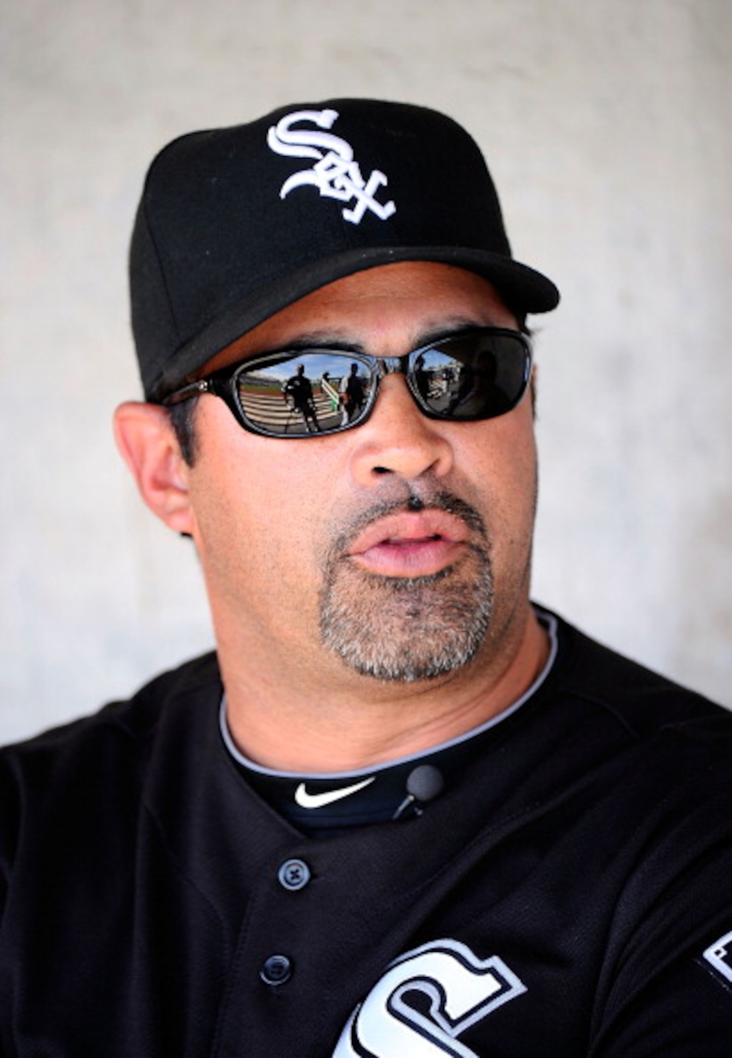 PHOENIX, AZ - MARCH 17:  Manager Ozzie Guillen #13 of the Chicago White Sox looks on against the Milwaukee Brewers during the spring training game at Maryvale Baseball Park on March 17, 2011 in Phoenix, Arizona.  (Photo by Kevork Djansezian/Getty Images)