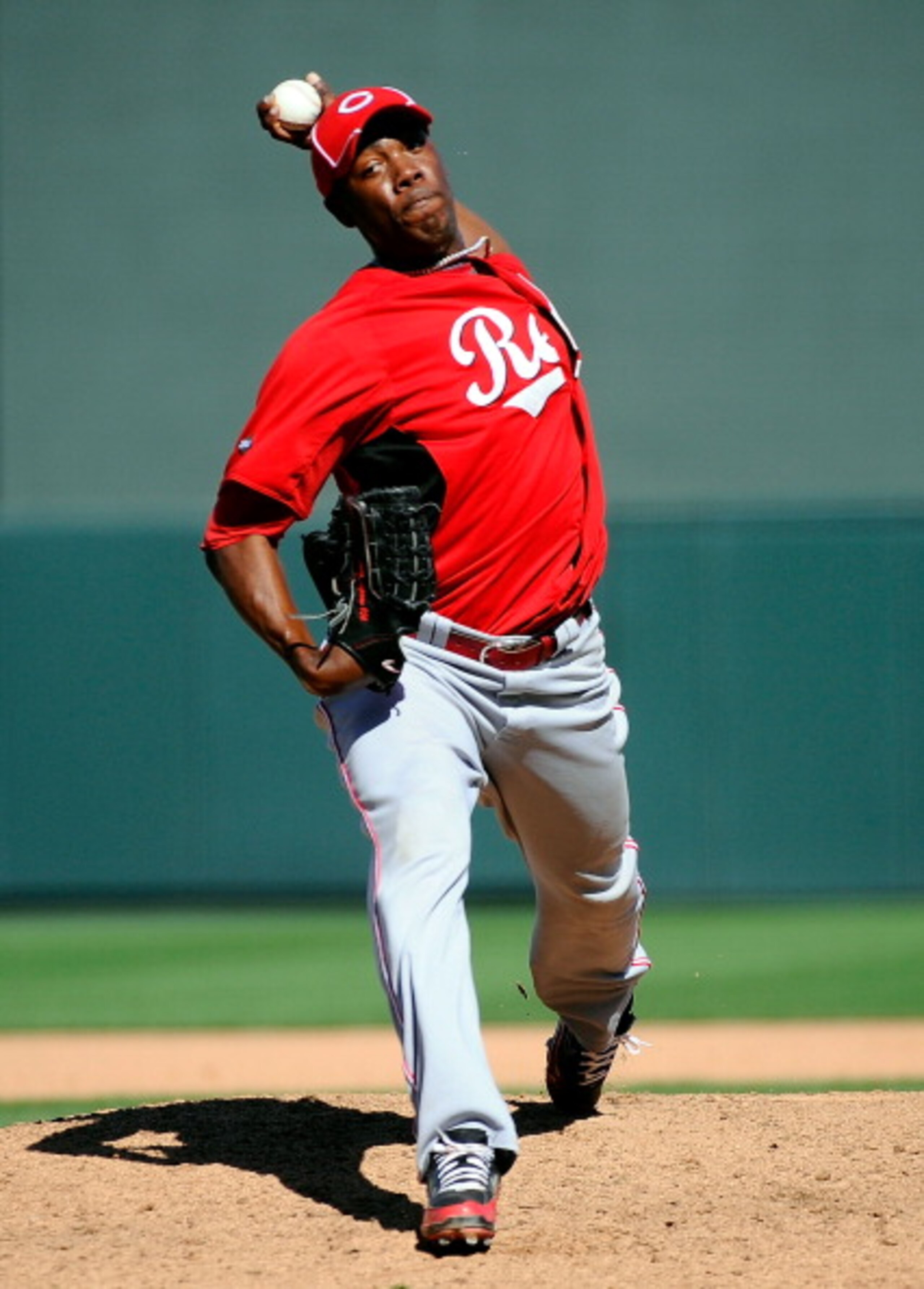 SCOTTSDALE, AZ - MARCH 14:  Pitcher Aroldis Chapman #54 of the Cincinnati Reds delivers against the Colorodo Rockies during the spring training baseball game at Salt River Fields at Talking Stick on March 14, 2011 in Scottsdale, Arizona.  (Photo by Kevork