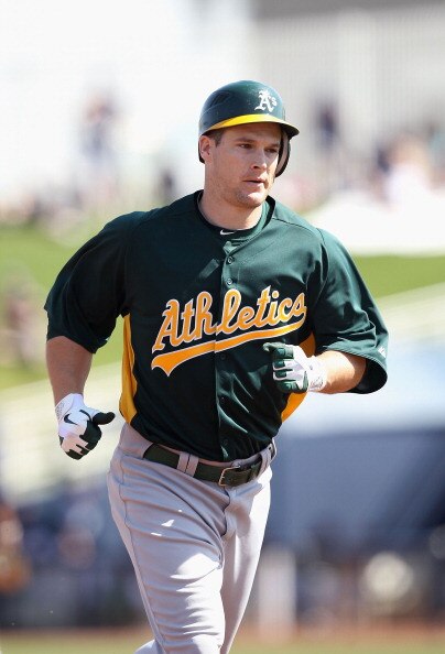 PHOENIX, AZ - MARCH 03:  Josh Willingham #16 of the Oakland Athletics rounds the bases after hitting a home run against the Milwaukee Brewers during the spring training game at Maryvale Baseball Park on March 3, 2011 in Phoenix, Arizona.  (Photo by Christ