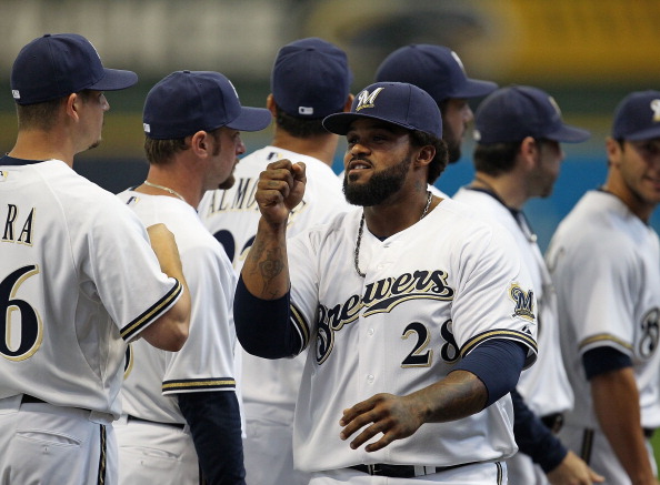 MILWAUKEE, WI - APRIL 04: Prince Fielder #28 of the Milwaukee Brewers greets teammates during player inrtoductions before the home opener against the Atlanta Braves at Miller Park on April 4, 2011 in Milwaukee, Wisconsin. The Braves defeated the Brewers 2