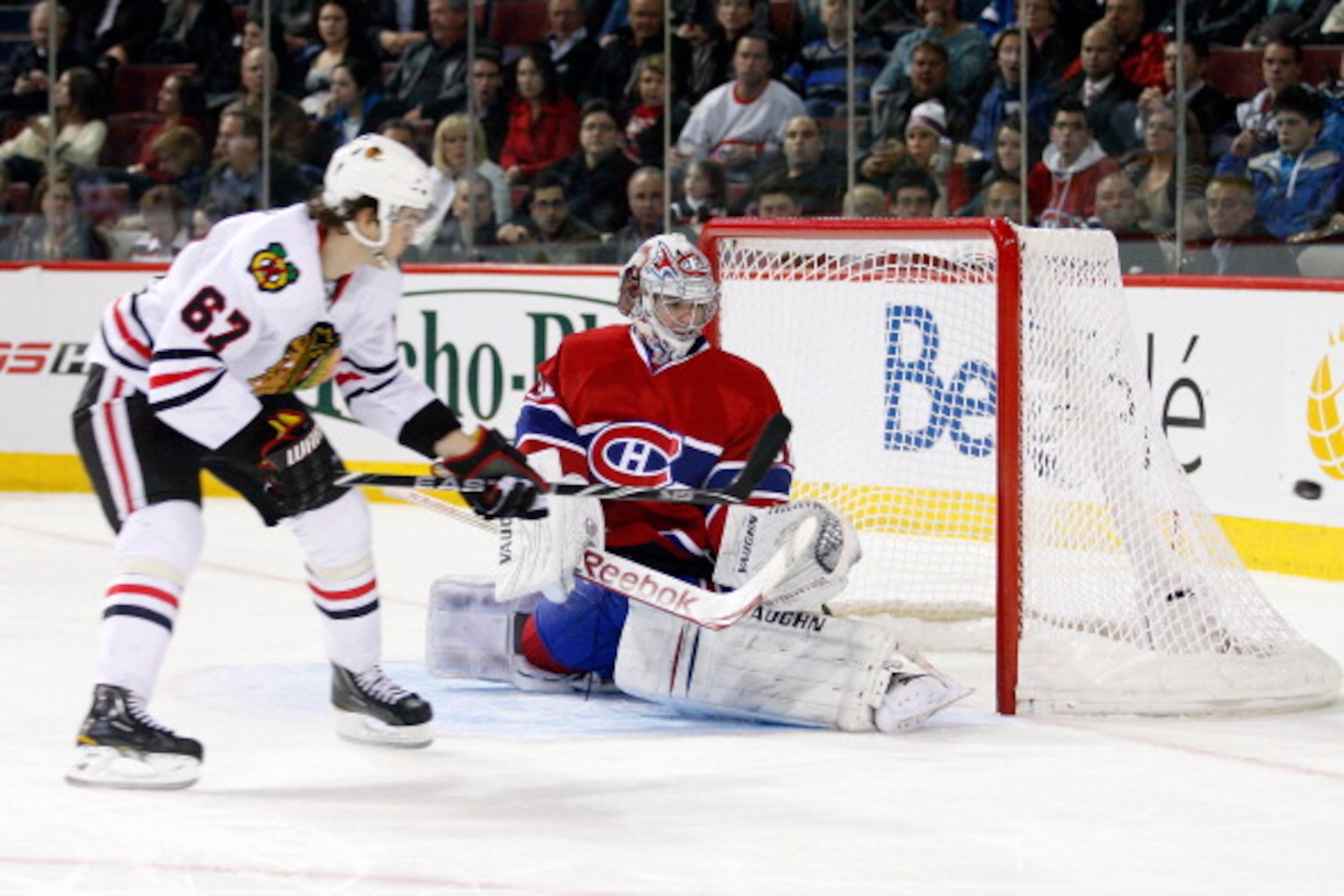 MONTREAL, CANADA - APRIL 5:  Michael Frolik #67 of the Chicago Blackhawks shoots the puck wide past Carey Price #31 of the Montreal Canadiens during the NHL game at the Bell Centre on April 5, 2011 in Montreal, Quebec, Canada.  The Canadiens defeated the