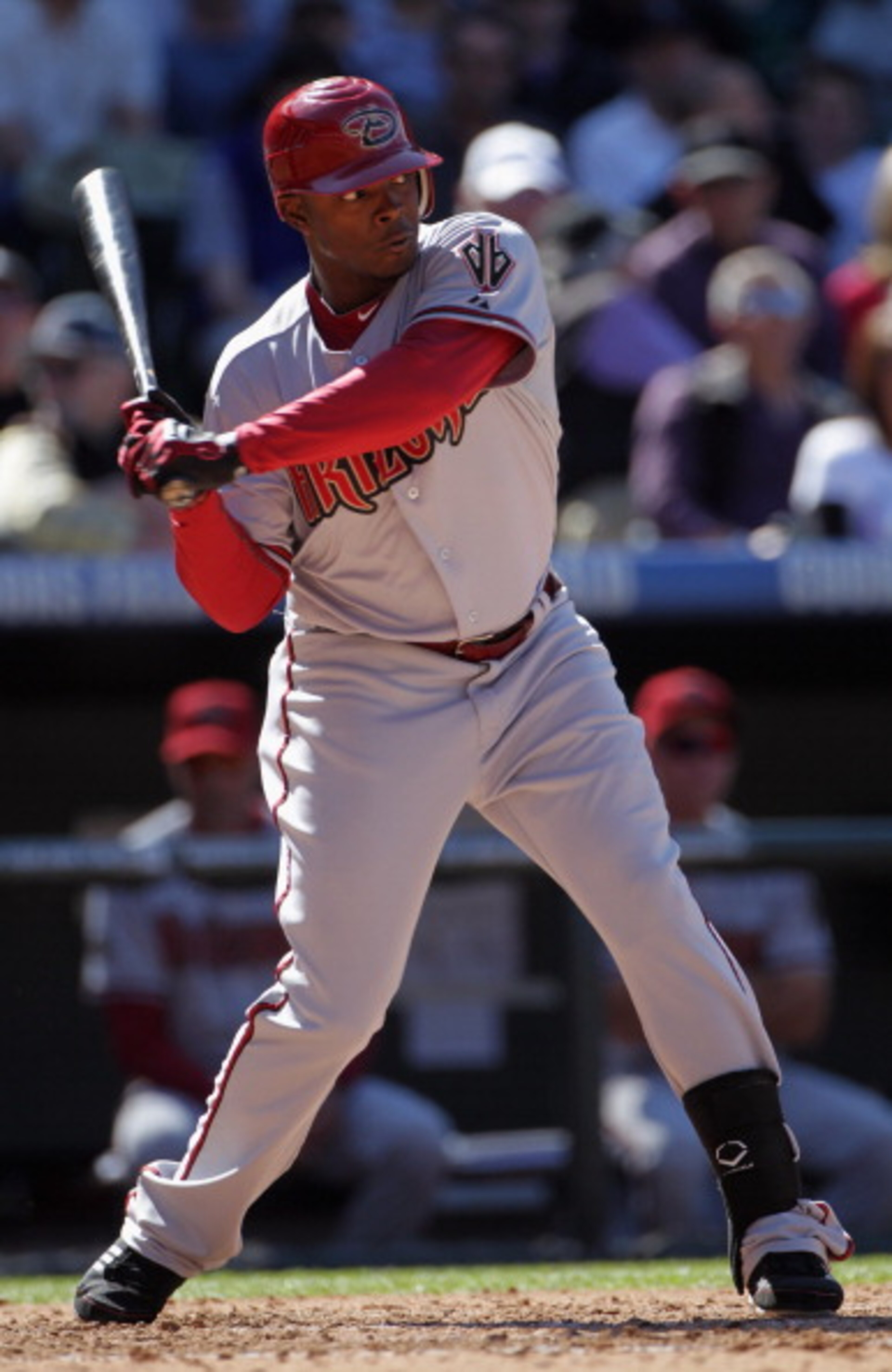 DENVER, CO - APRIL 01: Justin Upton #10 of the Arizona Diamondbacks takes an at bat against the Colorado Rockies during Opening Day at Coors Field on April 1, 2011 in Denver, Colorado. The Diamondbacks defeated the Rockies 7-6 in 11 innings. (Photo by D DENVER, CO - APRIL 01: Justin Upton #10 of the Arizona Diamondbacks takes an at bat against the Colorado Rockies during Opening Day at Coors Field on April 1, 2011 in Denver, Colorado. The Diamondbacks defeated the Rockies 7-6 in 11 innings. (Photo by D