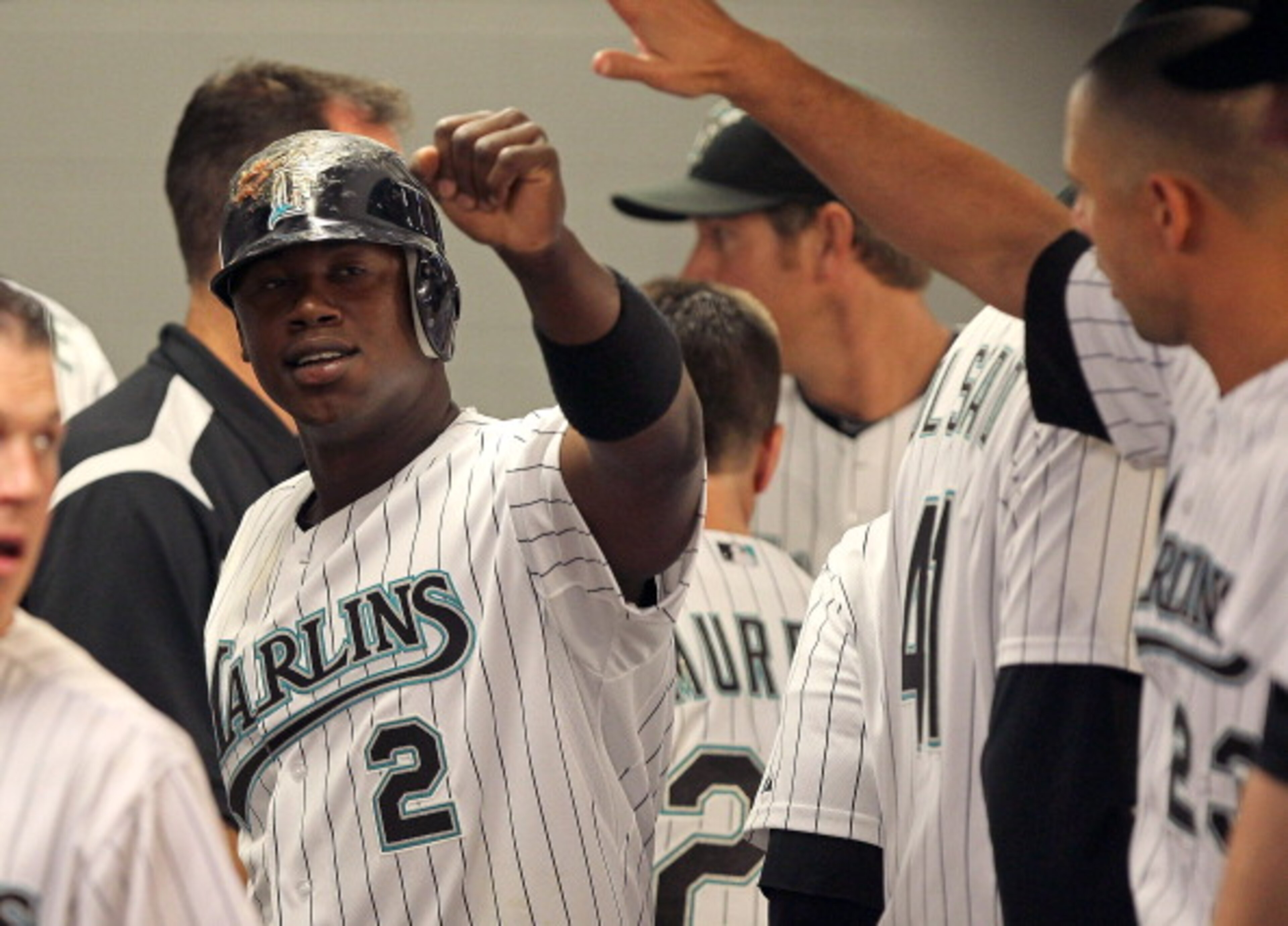 MIAMI GARDENS, FL - APRIL 01: Hanley Ramirez #2 of the Florida Marlins is congratulated after scoring a run during opening day against the New York Mets at Sun Life Stadium on April 1, 2011 in Miami Gardens, Florida. (Photo by Mike Ehrmann/Getty Images) MIAMI GARDENS, FL - APRIL 01: Hanley Ramirez #2 of the Florida Marlins is congratulated after scoring a run during opening day against the New York Mets at Sun Life Stadium on April 1, 2011 in Miami Gardens, Florida. (Photo by Mike Ehrmann/Getty Images)