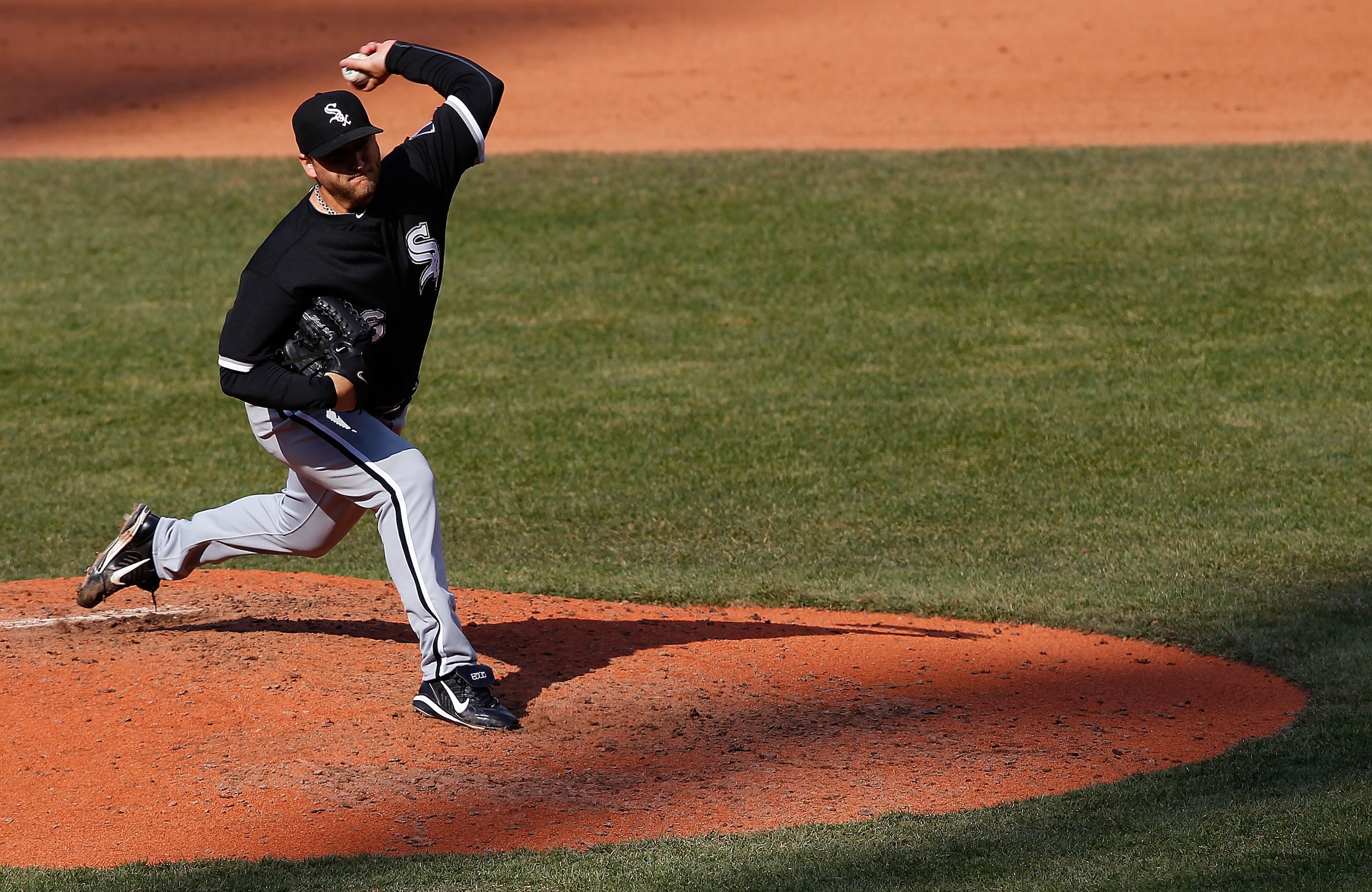 CLEVELAND - APRIL 01:  Mark Buehrle #56 of the Chicago White Sox pitches against  the Cleveland Indians during the Opening Day game on April 1, 2011 at Progressive Field in Cleveland, Ohio.  (Photo by Jared Wickerham/Getty Images)