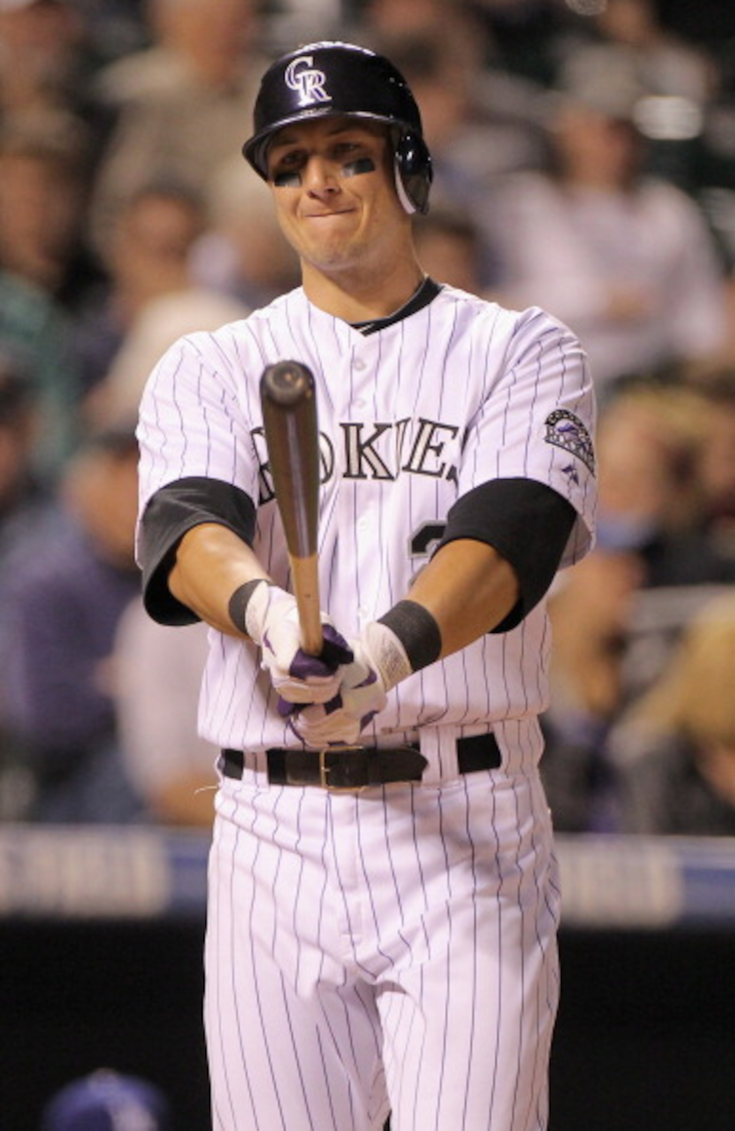 DENVER, CO - APRIL 05:  Troy Tulowitzki #2 of the Colorado Rockies takes an at bat against the Los Angeles Dodgers at Coors Field on April 5, 2011 in Denver, Colorado. The Rockies defeated the Los Angeles Dodgers 3-0.  (Photo by Doug Pensinger/Getty Image
