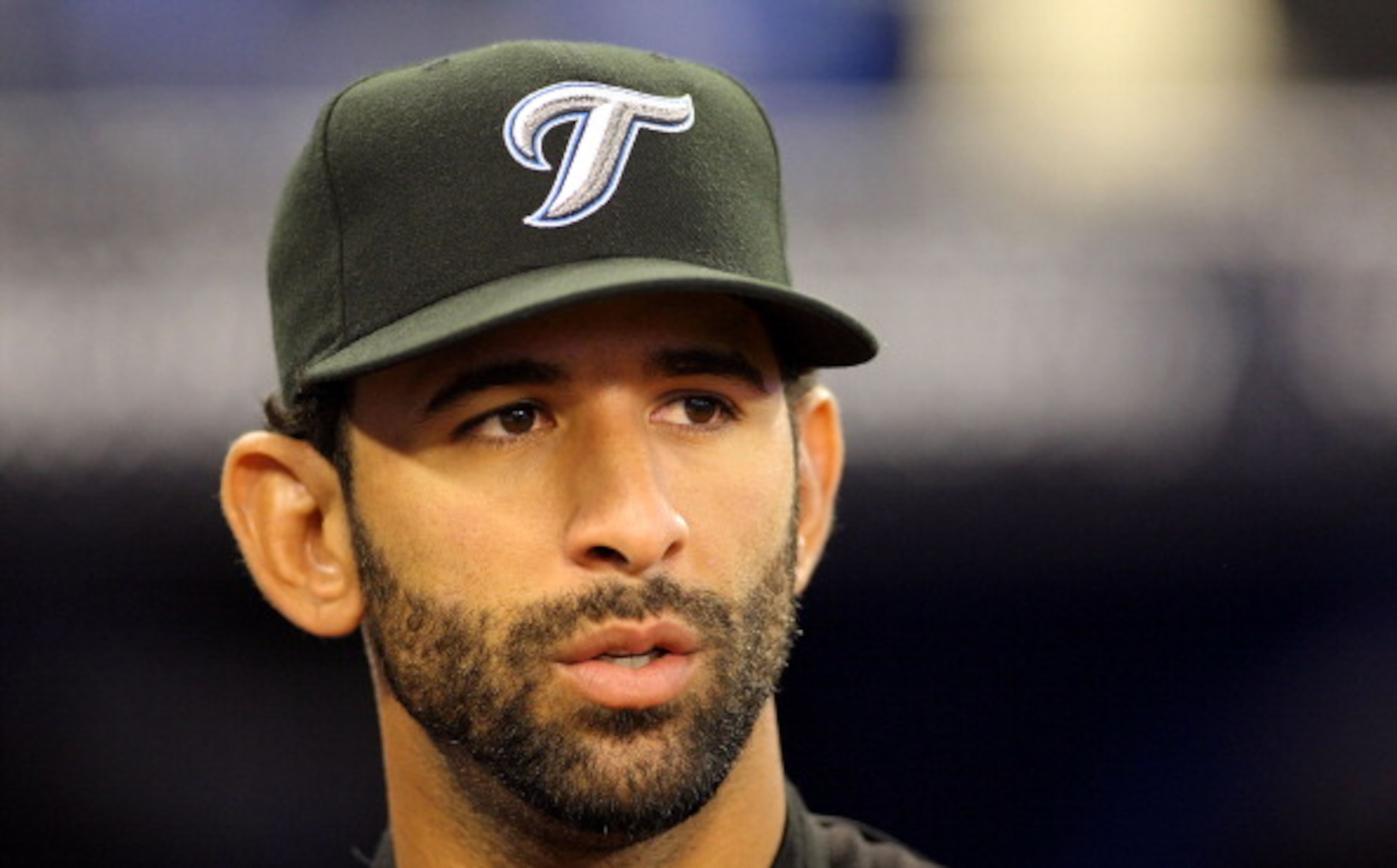 TORONTO,CANADA - APRIL 1:  Jose Bautista #19 of the Toronto Blue Jays gives an interview prior to the home opener for the Toronto Blue Jays as they face the Minnesota Twins during their MLB game at the Rogers Centre April 1, 2011 in Toronto, Ontario, Cana