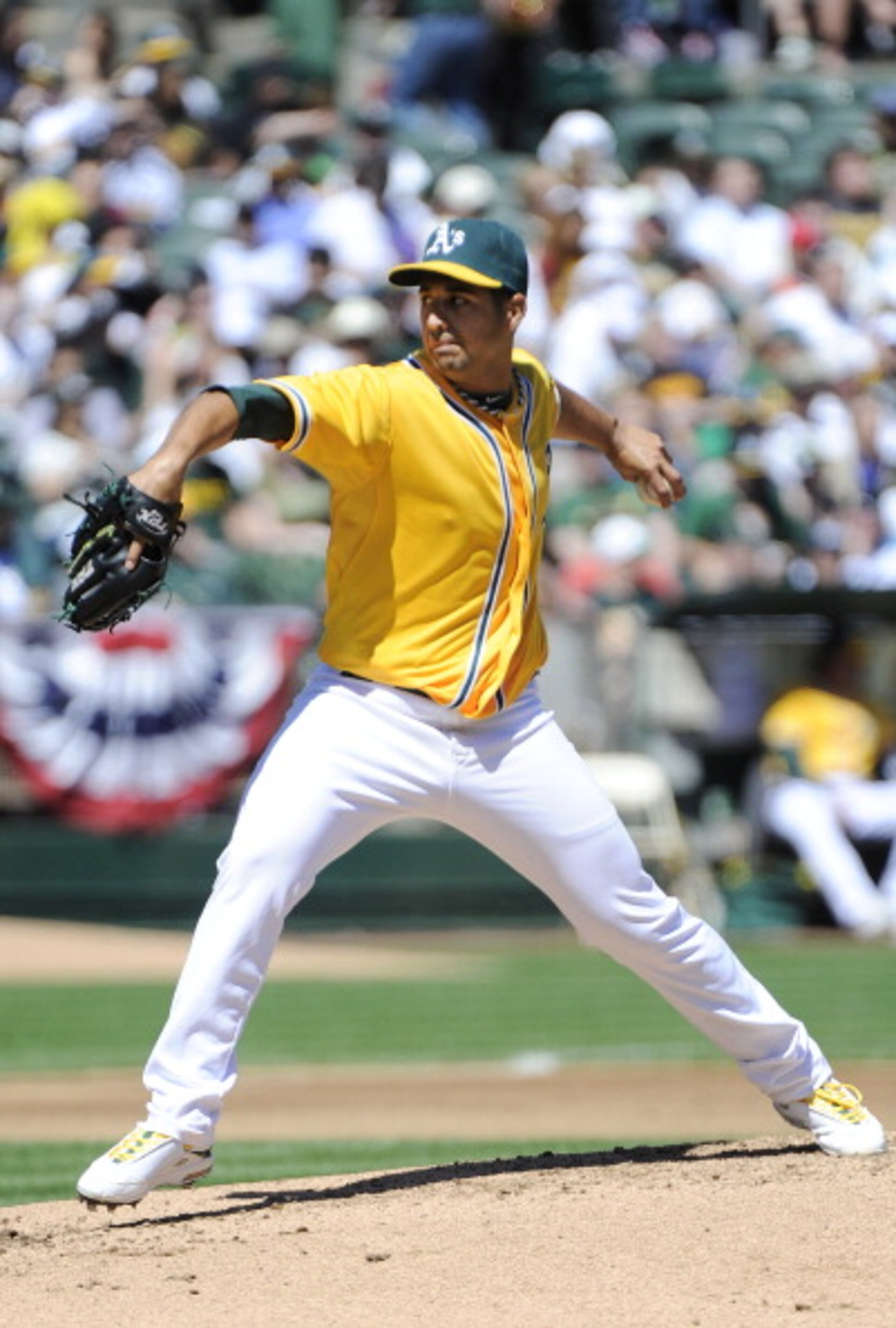 OAKLAND, CA - APRIL 3: Gio Gonzalez #47 of the Oakland Athletics pitches against the Seattle Mariners during a MLB baseball game at the Oakland-Alameda County Coliseum April 3, 2011 in Oakland, California.  (Photo by Thearon W. Henderson/Getty Images)