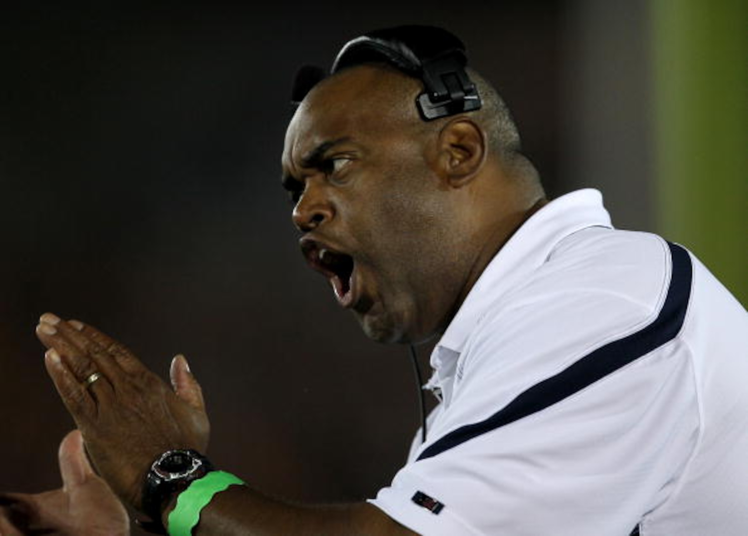 LOS ANGELES - SEPTEMBER 11:  Head coach Mike London of the Virginia Cavaliers exhorts his team against the USC Trojans at Los Angeles Memorial Coliseum on September 11, 2010 in Los Angeles, California. (Photo by Stephen Dunn/Getty Images)
