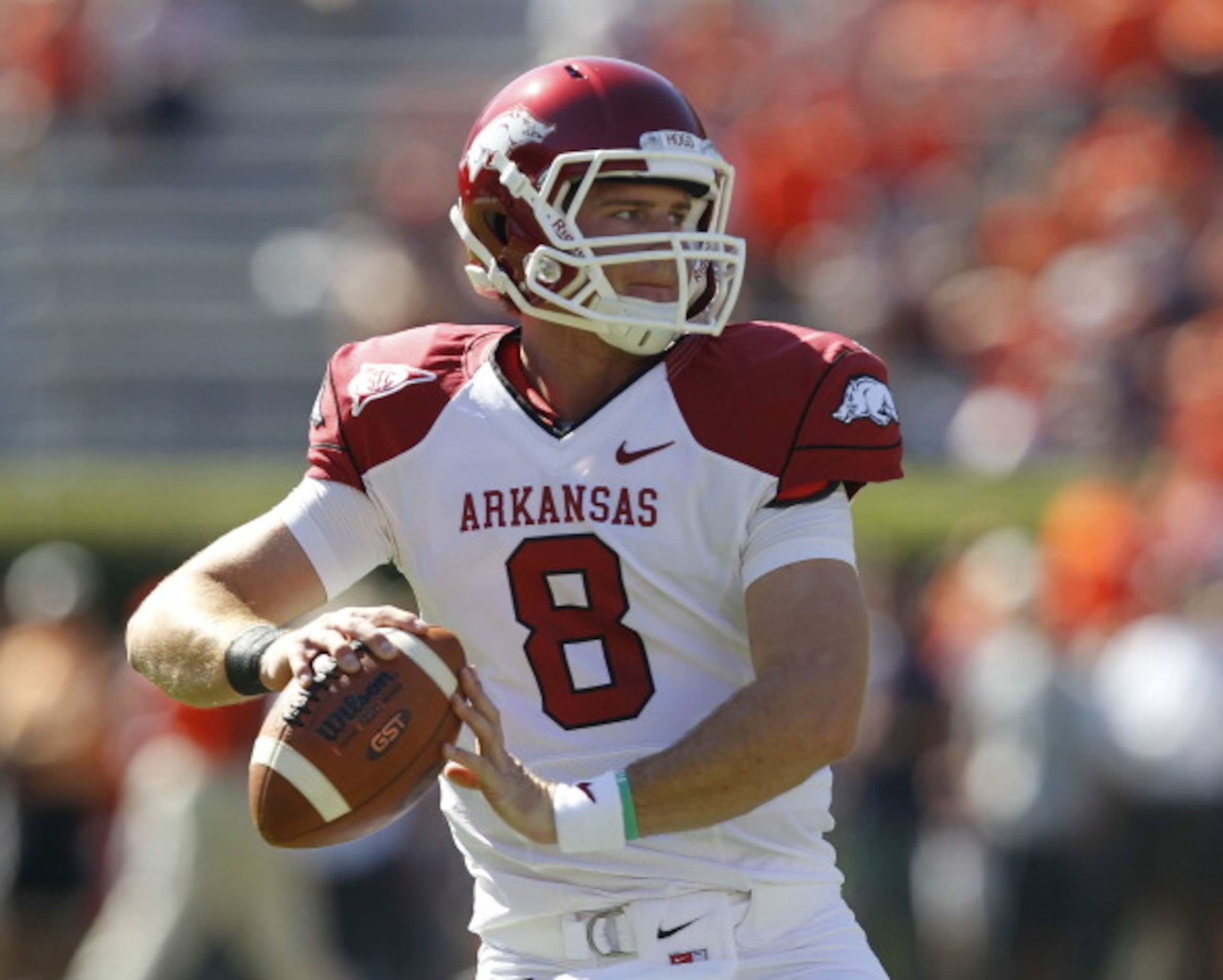AUBURN, AL - OCTOBER 16:  Quarterback Tyler Wilson #8 of the Arkansas Razorbacks drops back and looks downfield before the game against the Auburn Tigers at Jordan-Hare Stadium on October 16, 2010 in Auburn, Alabama.  The Tigers beat the Razorbacks 65-43.