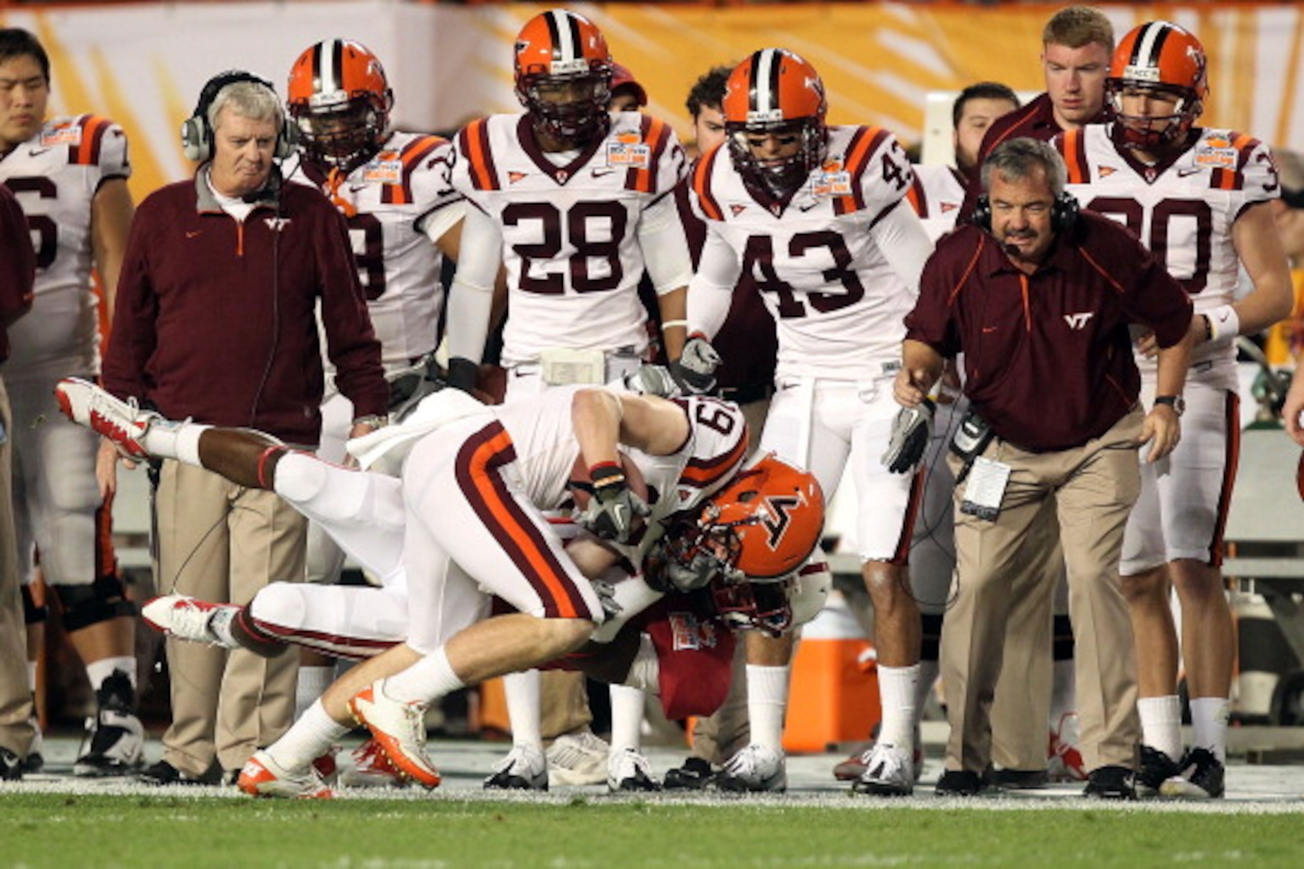 MIAMI, FL - JANUARY 03:  Danny Coale #19 of the Virginia Tech Hokies makes a reception in front of head coach Frank Beamer (L) the Stanford Cardinal during the 2011 Discover Orange Bowl at Sun Life Stadium on January 3, 2011 in Miami, Florida. Stanford wo