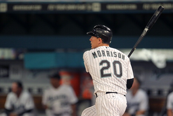 MIAMI GARDENS, FL - APRIL 01: Logan Morrison #20 of the Florida Marlins hits a solo home run during opening day against the New York Mets at Sun Life Stadium on April 1, 2011 in Miami Gardens, Florida.  (Photo by Mike Ehrmann/Getty Images)