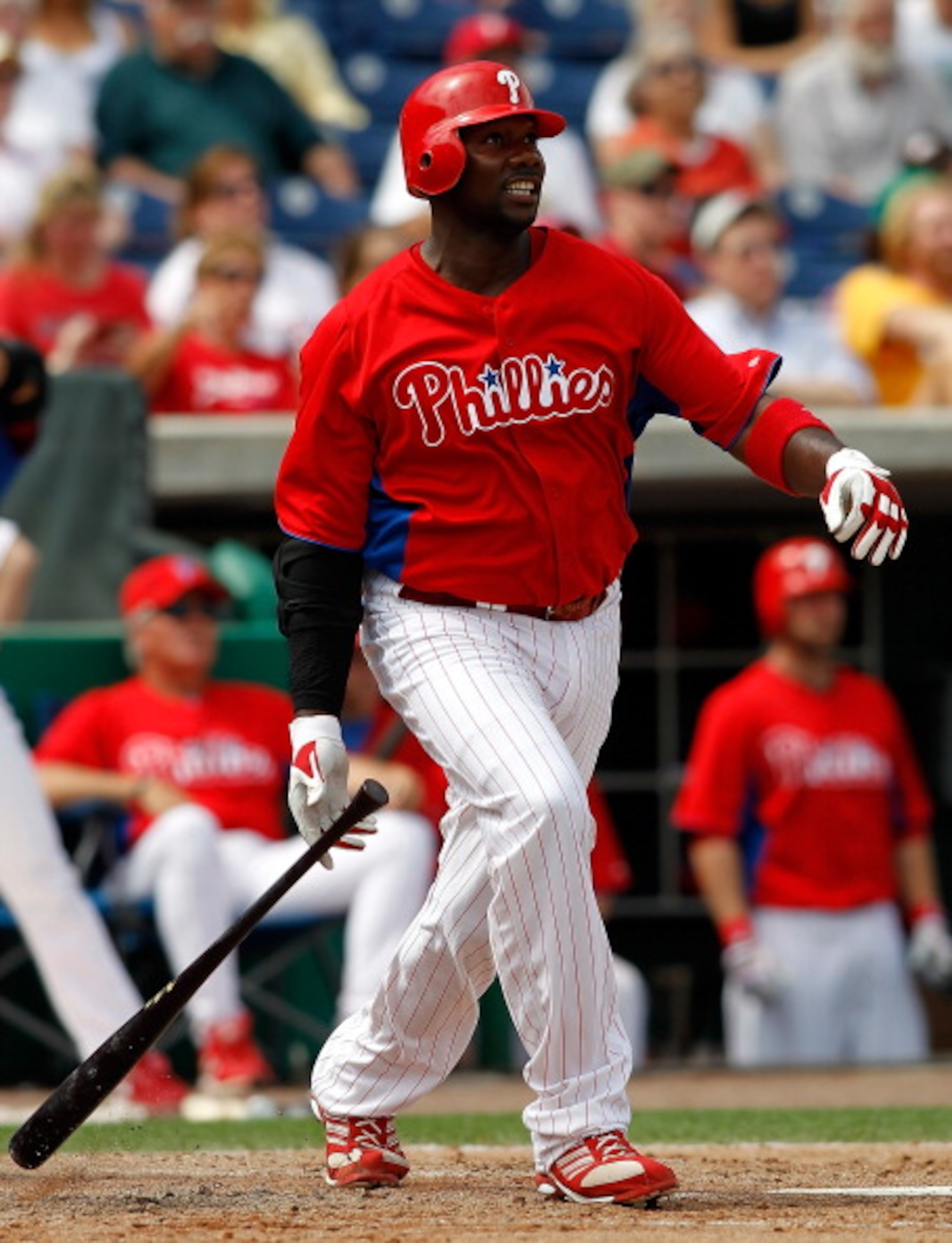 CLEARWATER, FL - MARCH 06:  First baseman Ryan Howard #6 of the Philadelphia Phillies watches his second inning home run against the Tampa Bay Rays during a Grapefruit League Spring Training Game at Bright House Field on March 6, 2011 in Sarasota, Florida