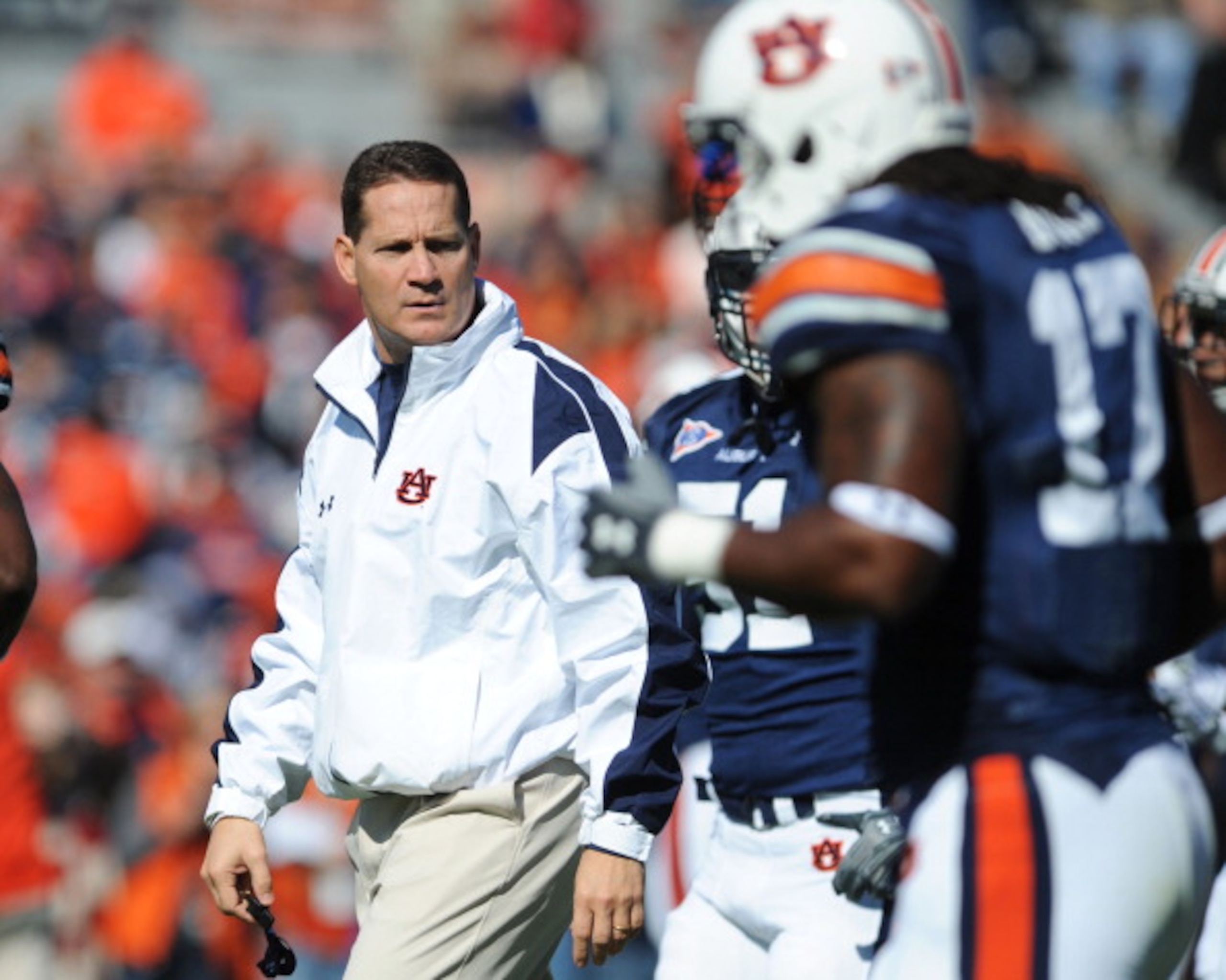 AUBURN, AL - NOVEMBER 06:  Coach Gene Chizik of the Auburn Tigers watches warmups before play against the Chattanooga Mocs November 6, 2010 at Jordan-Hare Stadium in Auburn, Alabama.  (Photo by Al Messerschmidt/Getty Images)