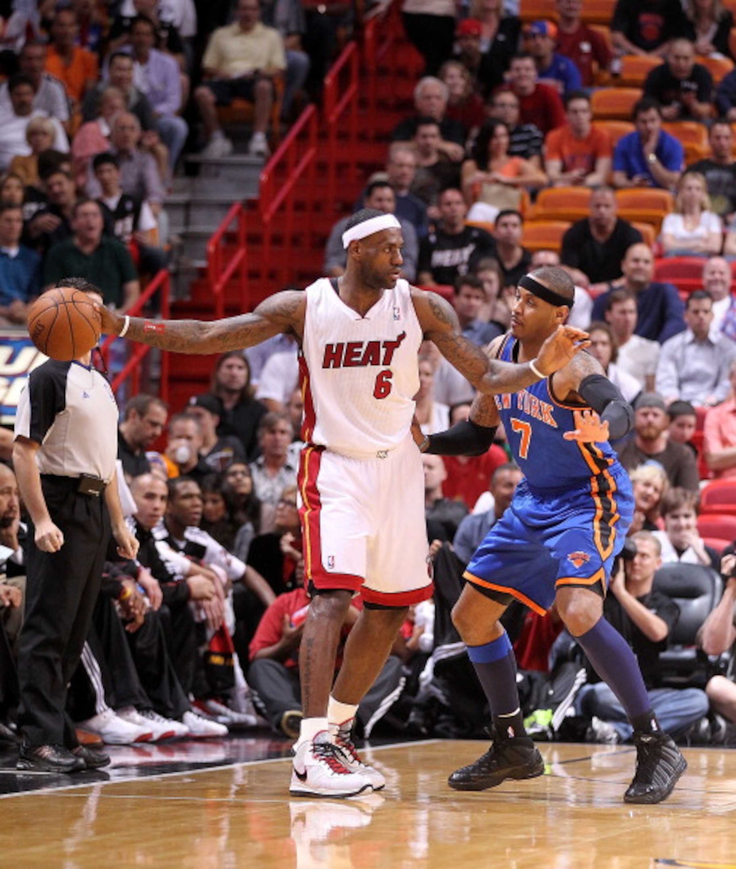 MIAMI, FL - FEBRUARY 27:  LeBron James #6 of the Miami Heat is guarded by Carmelo Anthony #7 of the New York Knicks looks on during a game at American Airlines Arena on February 27, 2011 in Miami, Florida. NOTE TO USER: User expressly acknowledges and agr