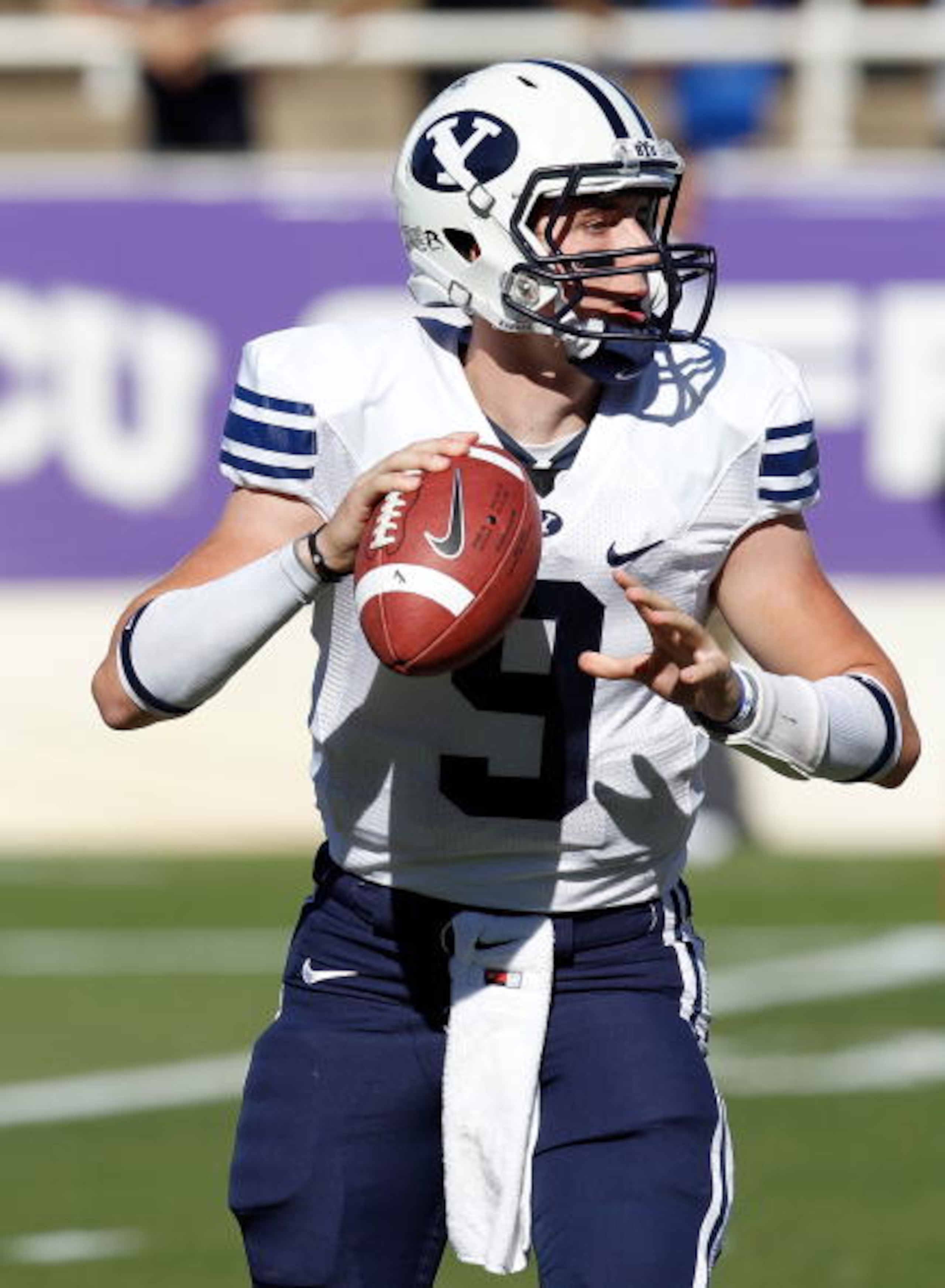 FORT WORTH, TX - OCTOBER 16:  Quarterback Jake Heaps #9 of the Brigham Young University Cougars throws a pass against the Texas Christian University Horned Frogs at Amon G. Carter Stadium on October 16, 2010 in Fort Worth, Texas.  (Photo by Tom Pennington