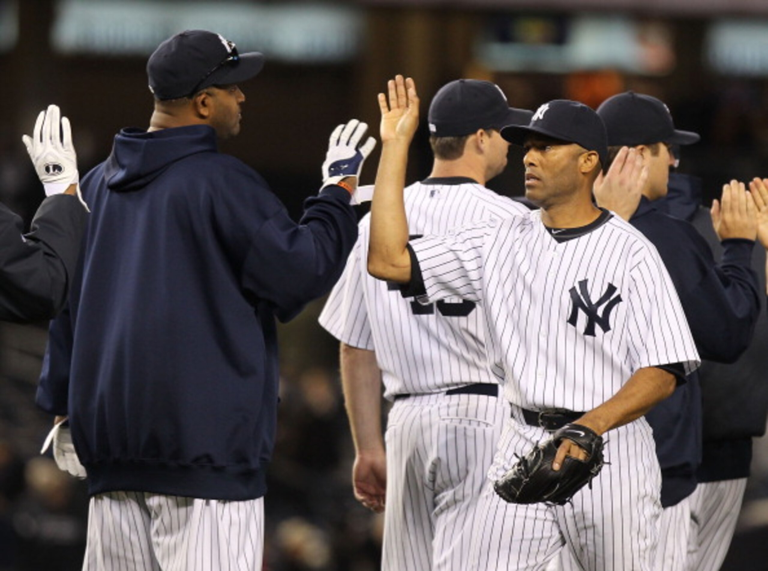 NEW YORK, NY - APRIL 02: Mariano Rivera #42 of the New York Yankees celebrates the win against the Detroit Tigers at Yankee Stadium on April 2, 2011 in the Bronx borough of New York City.  (Photo by Nick Laham/Getty Images)