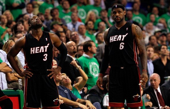 BOSTON, MA - OCTOBER 26: LeBron James #6 and Dwyane Wade #3 of the Miami Heat walk onto the court after a time out in the fourth quarter against the Boston Celtics at the TD Banknorth Garden on October 26, 2010 in Boston, Massachusetts.  The Heat lost 88-