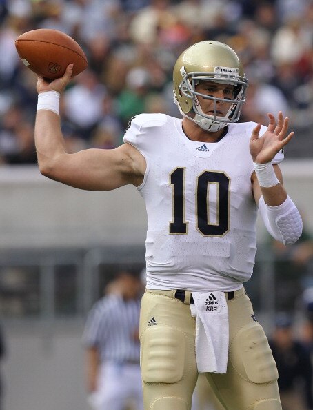 EAST RUTHERFORD, NJ - OCTOBER 23:  Dayne Crist #10 of the Notre Dame Fighting Irish passes against the Navy Midshipmen at New Meadowlands Stadium on October 23, 2010 in East Rutherford, New Jersey.  (Photo by Nick Laham/Getty Images)