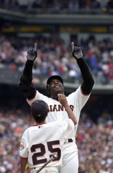 SAN FRANCISCO - OCTOBER 7:  Barry Bonds #25 of the San Francisco Giants celebrates his 73rd home run in front of his son Nikolai against the Los Angeles Dodgers on October 7, 2001 at Pacific Bell Park in San Francisco, California.  The Giants won 2-1.  (P