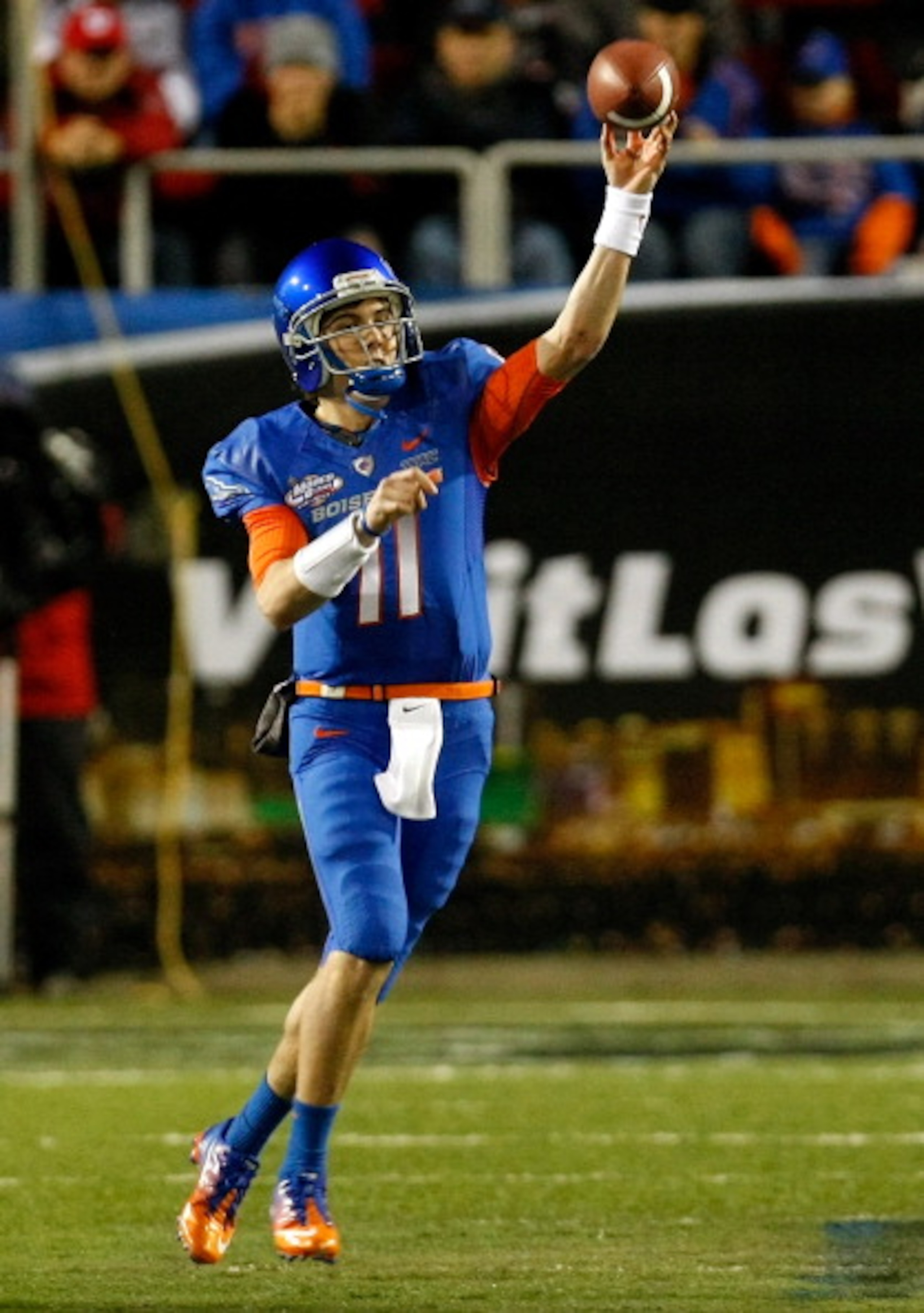 LAS VEGAS, NV - DECEMBER 22:  Quarterback Kellen Moore #11 of the Boise State Broncos throws for yardage against the Utah Utes during the MAACO Bowl Las Vegas at Sam Boyd Stadium December 22, 2010 in Las Vegas, Nevada. Boise State Won 26-3.  (Photo by Eth