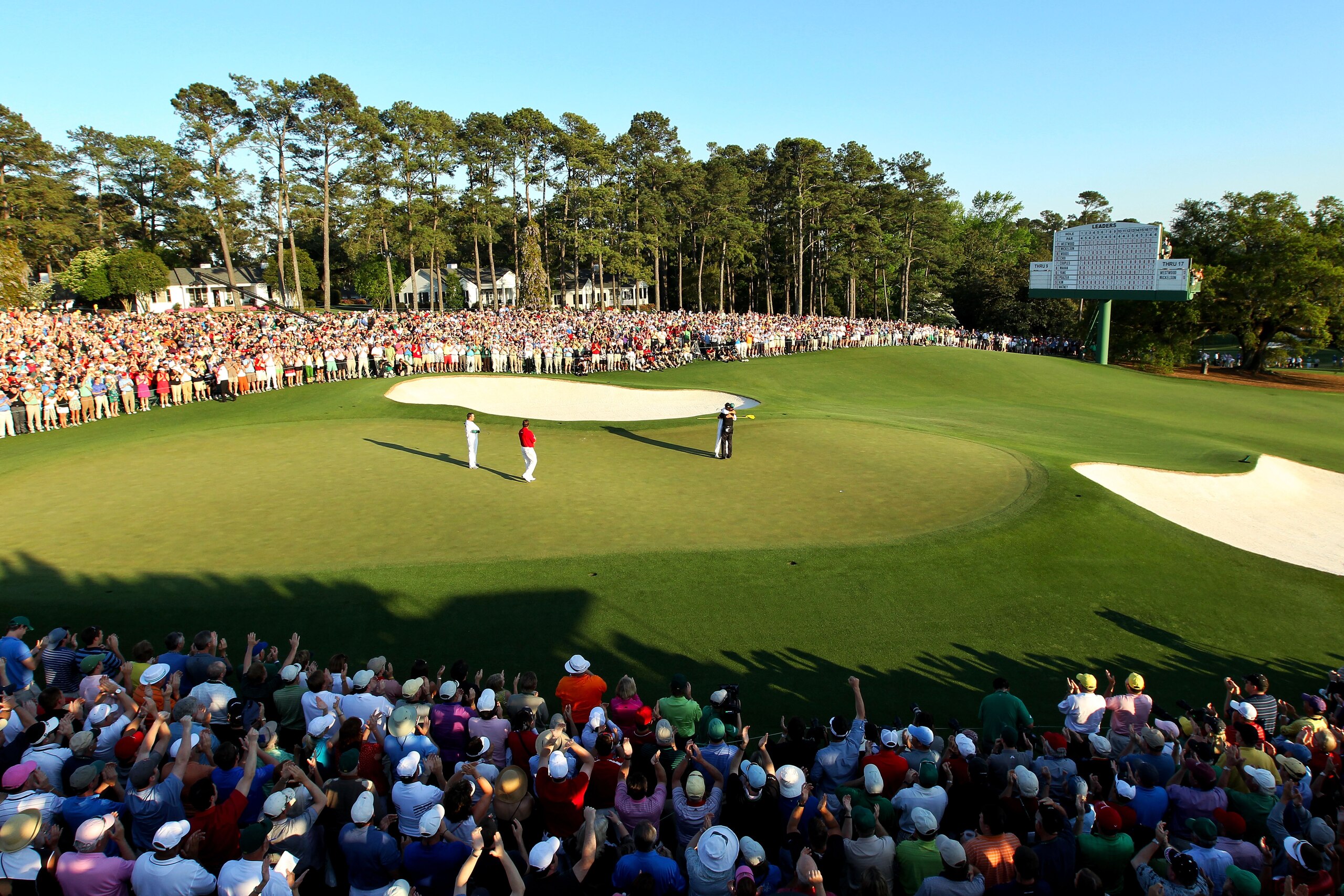 AUGUSTA, GA - APRIL 11:  Phil Mickelson celebrates his three-stroke victory as Lee Westwood of England looks on during the 2010 Masters Tournament at Augusta National Golf Club on April 11, 2010 in Augusta, Georgia.  (Photo by David Cannon/Getty Images)